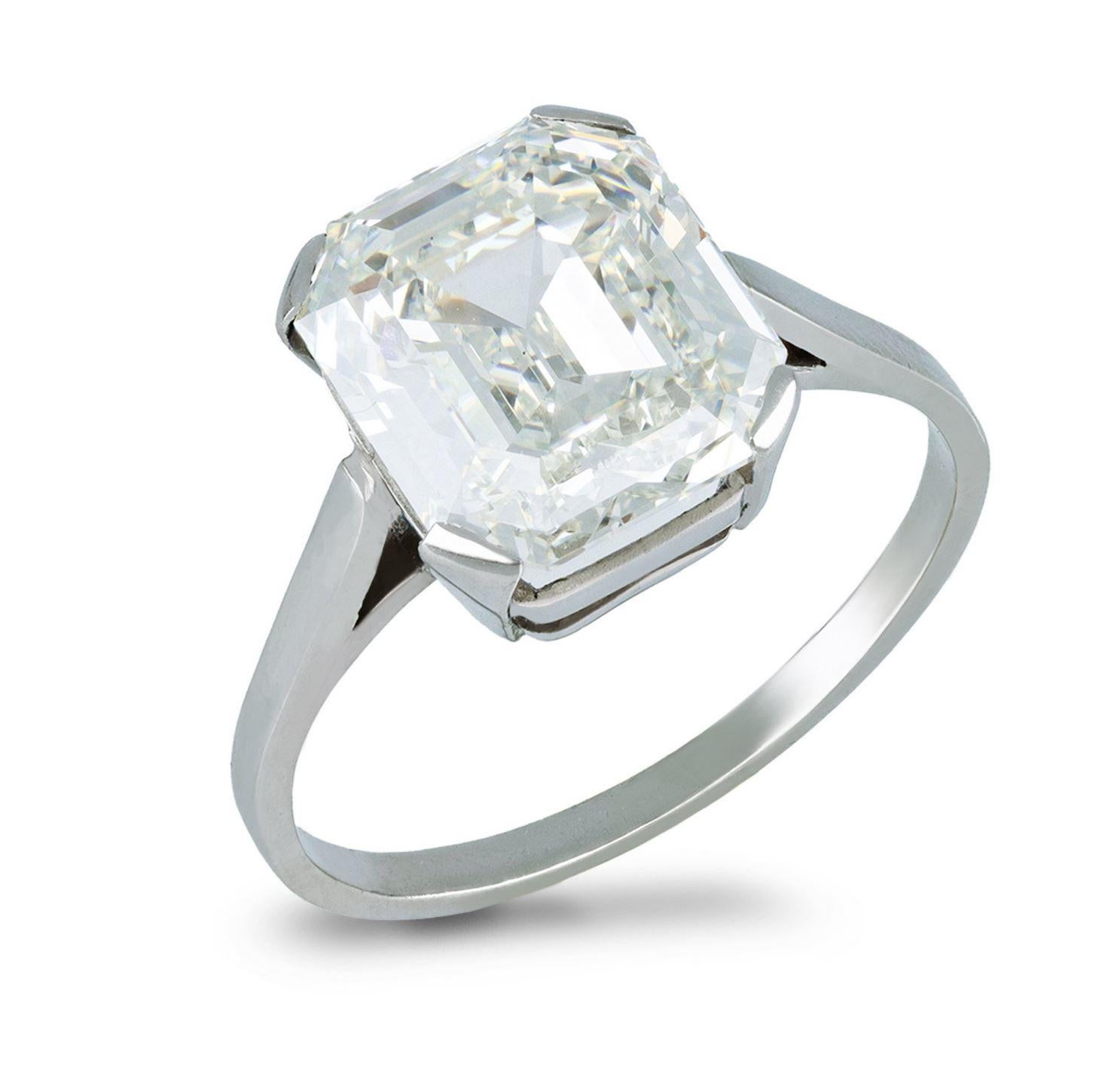 Emerald-cut diamond solitaire diamond ring. Set with an octagonal emerald-cut diamond, I colour, VS1 clarity with a weight of 4.63 carats in an open back claw setting, to an impressive solitaire design featuring stylised claws, a structured pierced