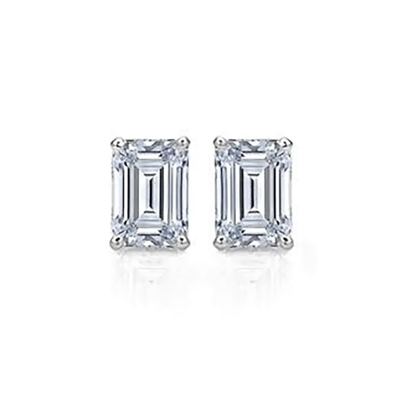 Contemporary Emerald Cut Diamond Stud Earrings  2 Carats Total For Sale