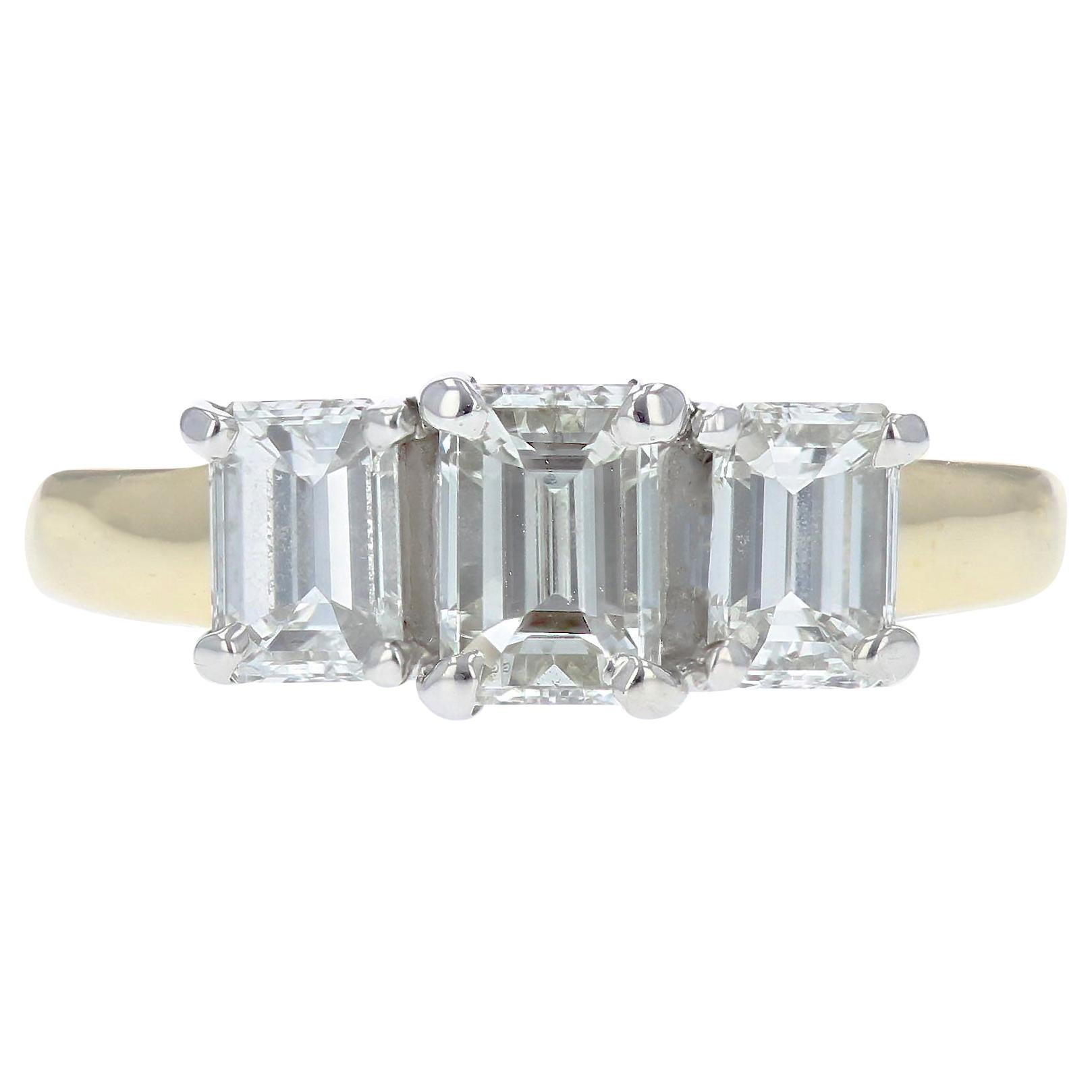 Magnificent Three Stone Emerald Cut Diamond Ring at 1stDibs