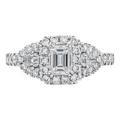 Roman Malakov 0.71 Carat Emerald Cut Diamond Three-Stone Halo Engagement Ring