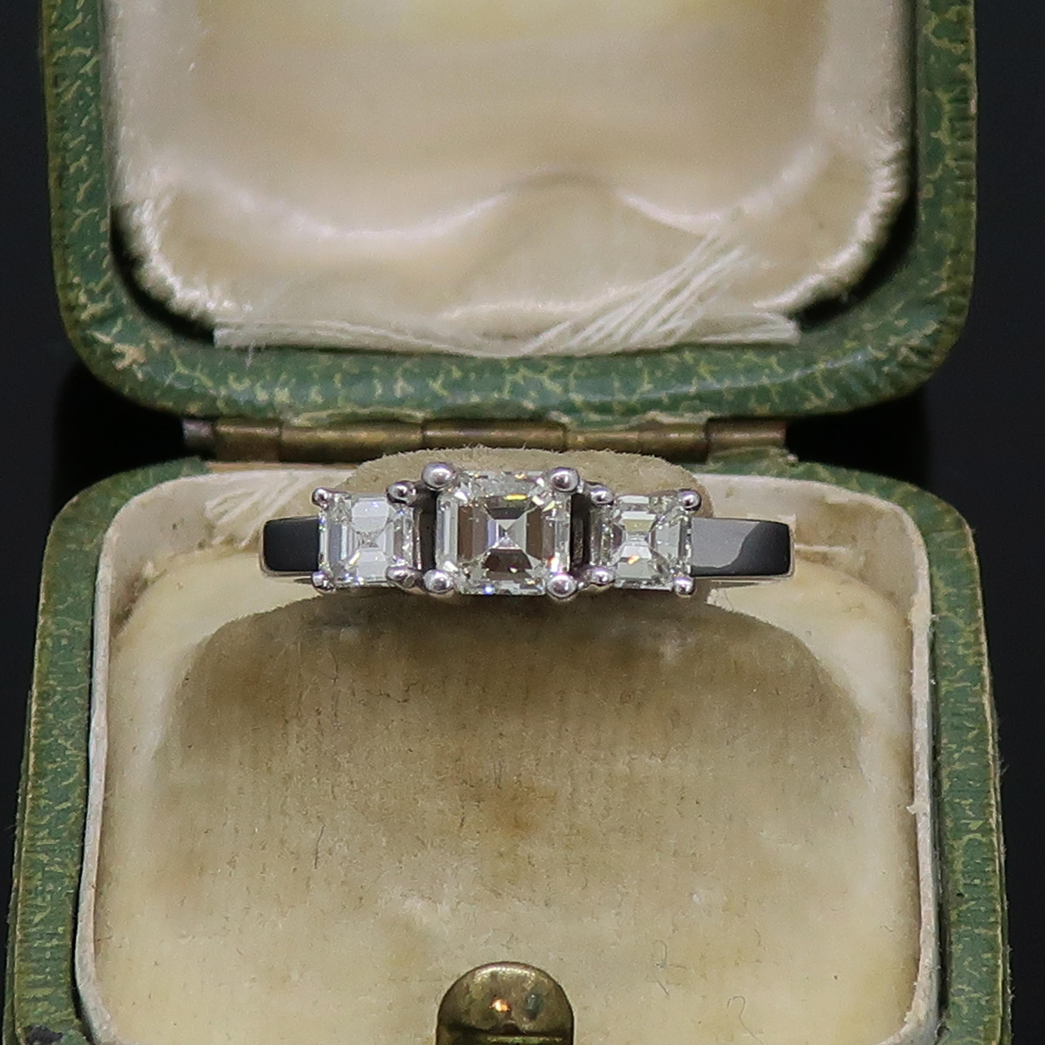 Emerald Cut Diamond Three-Stone Ring 18 Karat White Gold 0.76ct For Sale 1