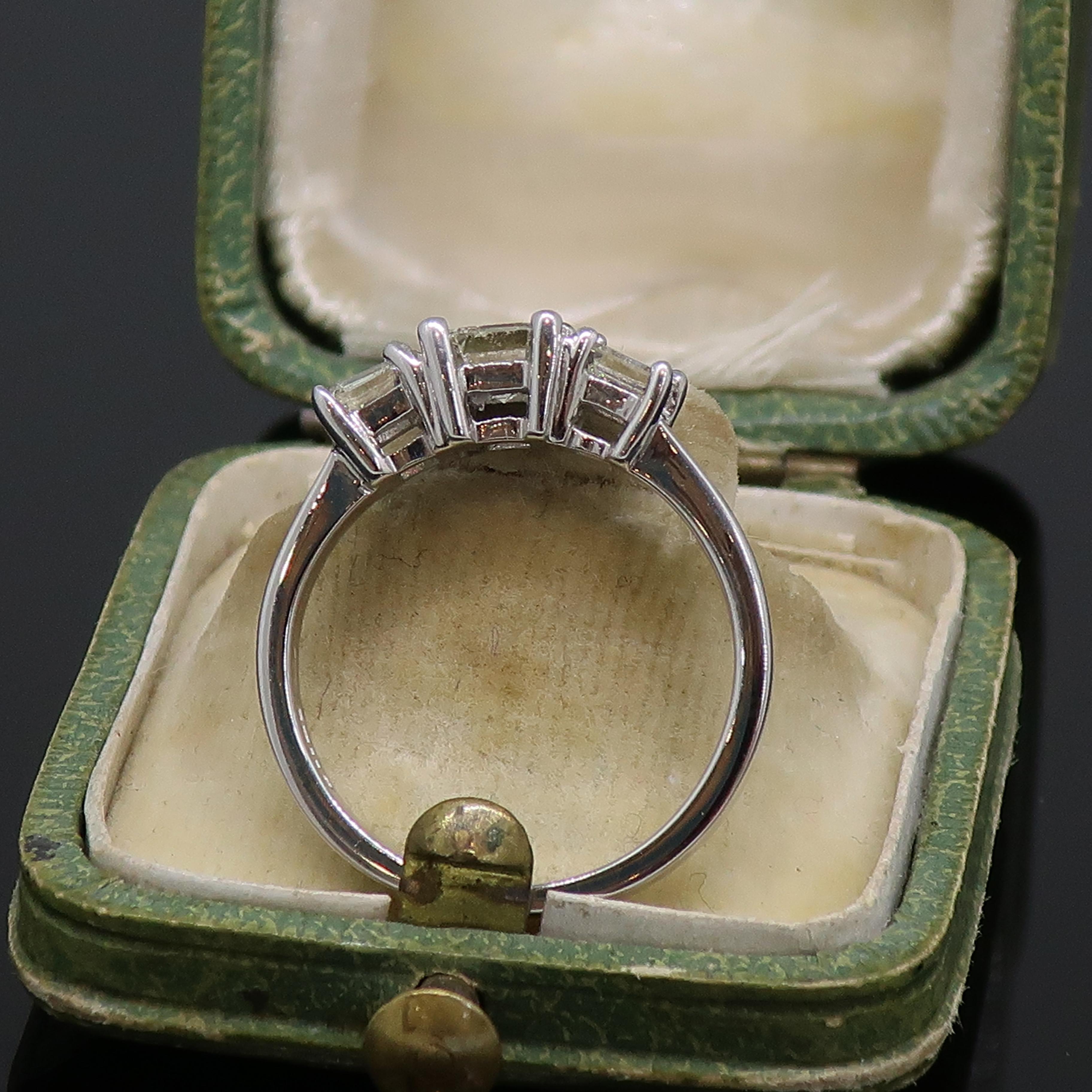 Emerald Cut Diamond Three-Stone Ring 18 Karat White Gold 0.76ct For Sale 2