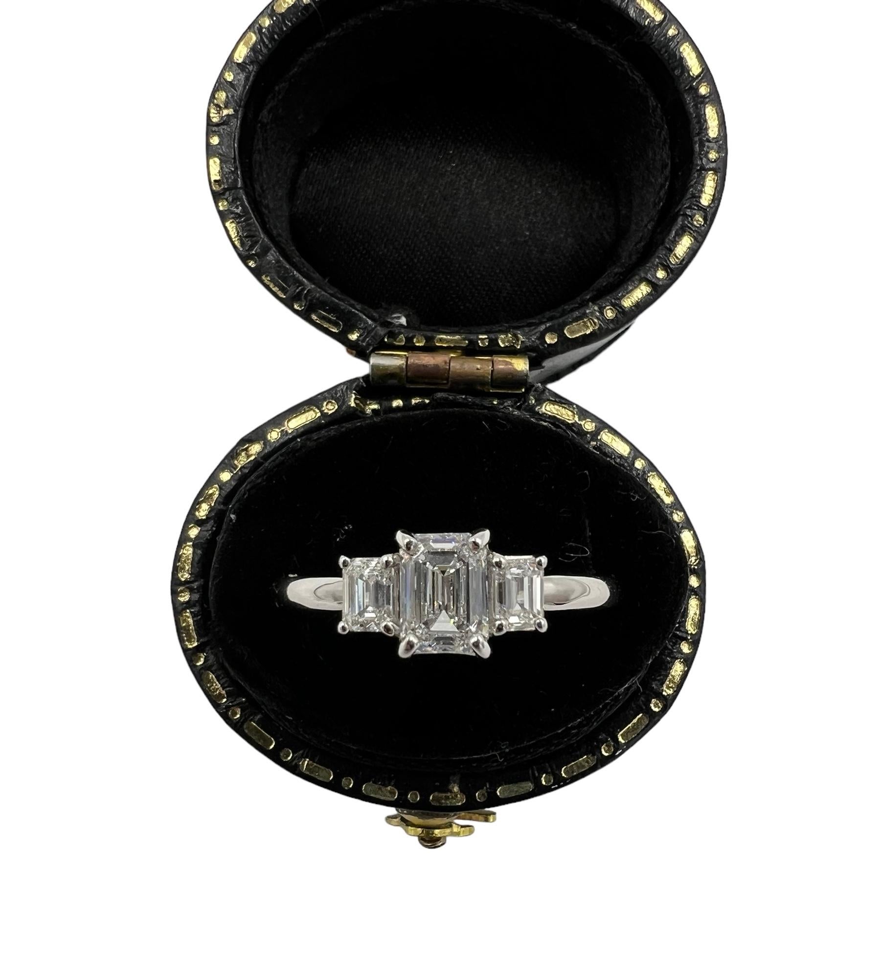 Contemporary Emerald Cut Diamond Three Stone Ring  For Sale