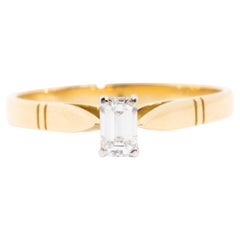 Emerald Cut Diamond Vintage Solitaire Engagement Ring in 18 Carat Yellow Gold