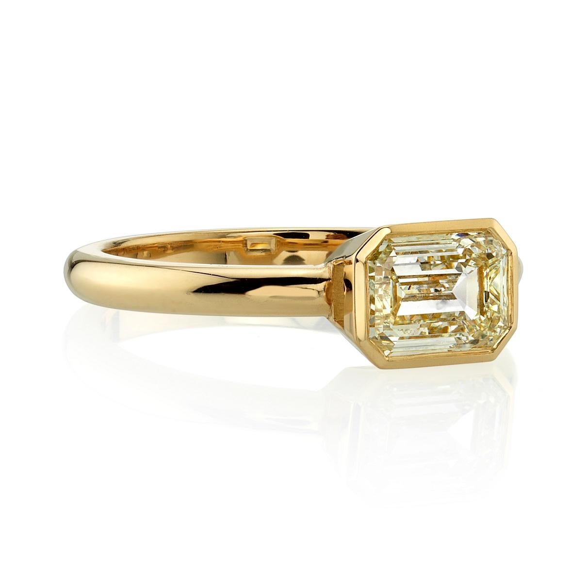 1.27ct N/VS1 GIA certified emerald cut diamond set in a handcrafted 18k yellow gold mounting. 

