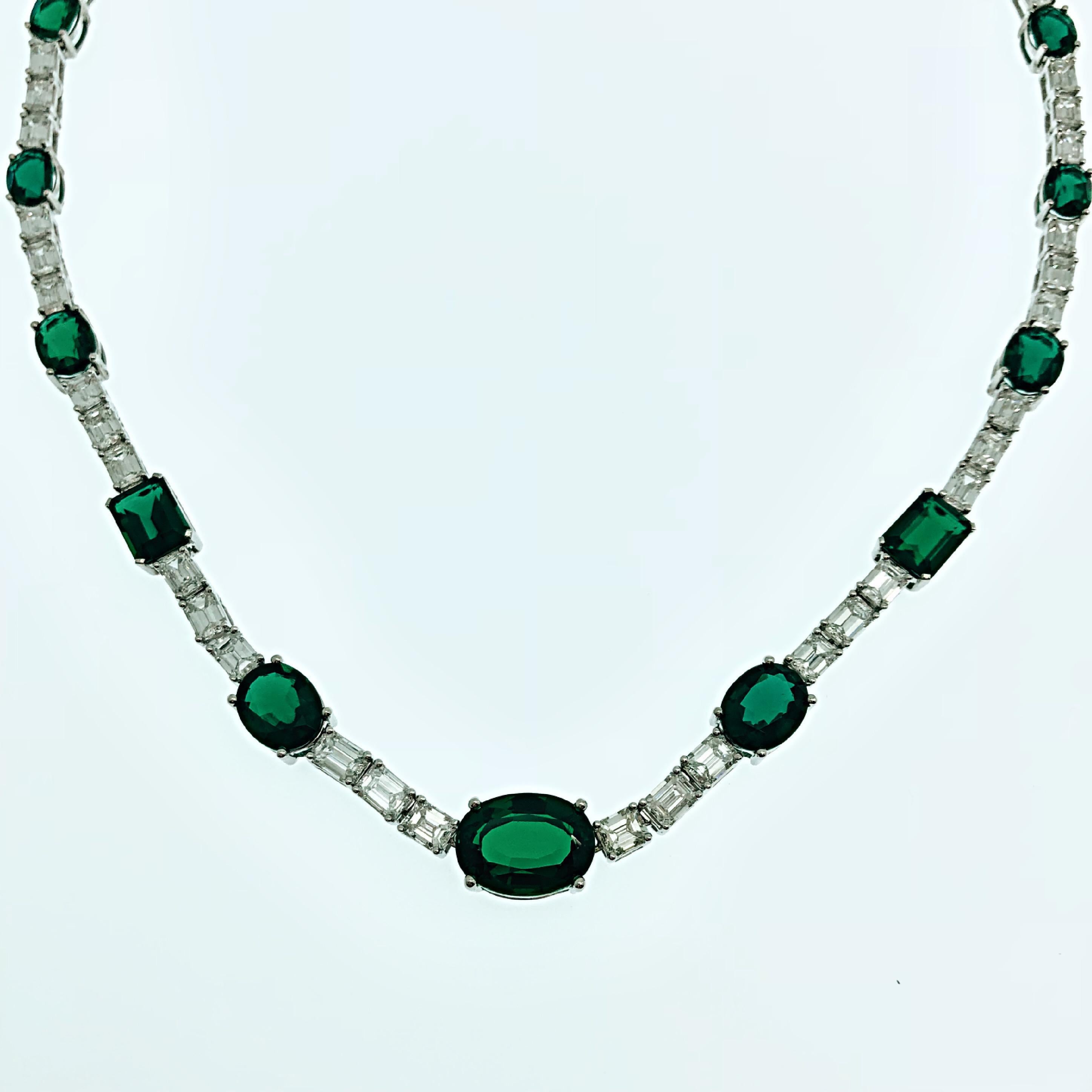 A necklace made to spark the most extravagant events and red carpets.
showcasing 13 LAB grown deep vivid green synthetic Emeralds of 26.96ct in total , 36 emerald cut natural diamonds of top range quality weighing a total of 12.67ct and 45 brilliant
