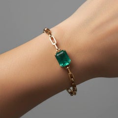 Bracciale a catena in oro giallo 14K con smeraldo tagliato a smeraldo