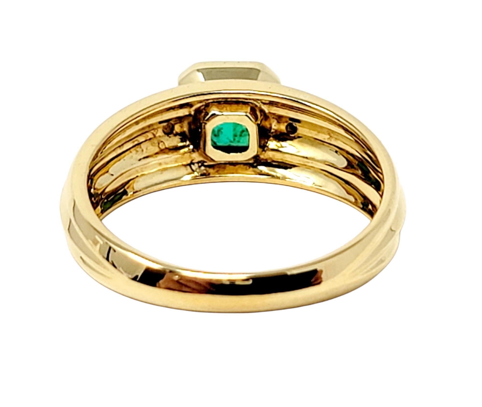 Women's Emerald Cut Emerald and Diamond Ridged Band Ring in 18 Karat Yellow Gold For Sale
