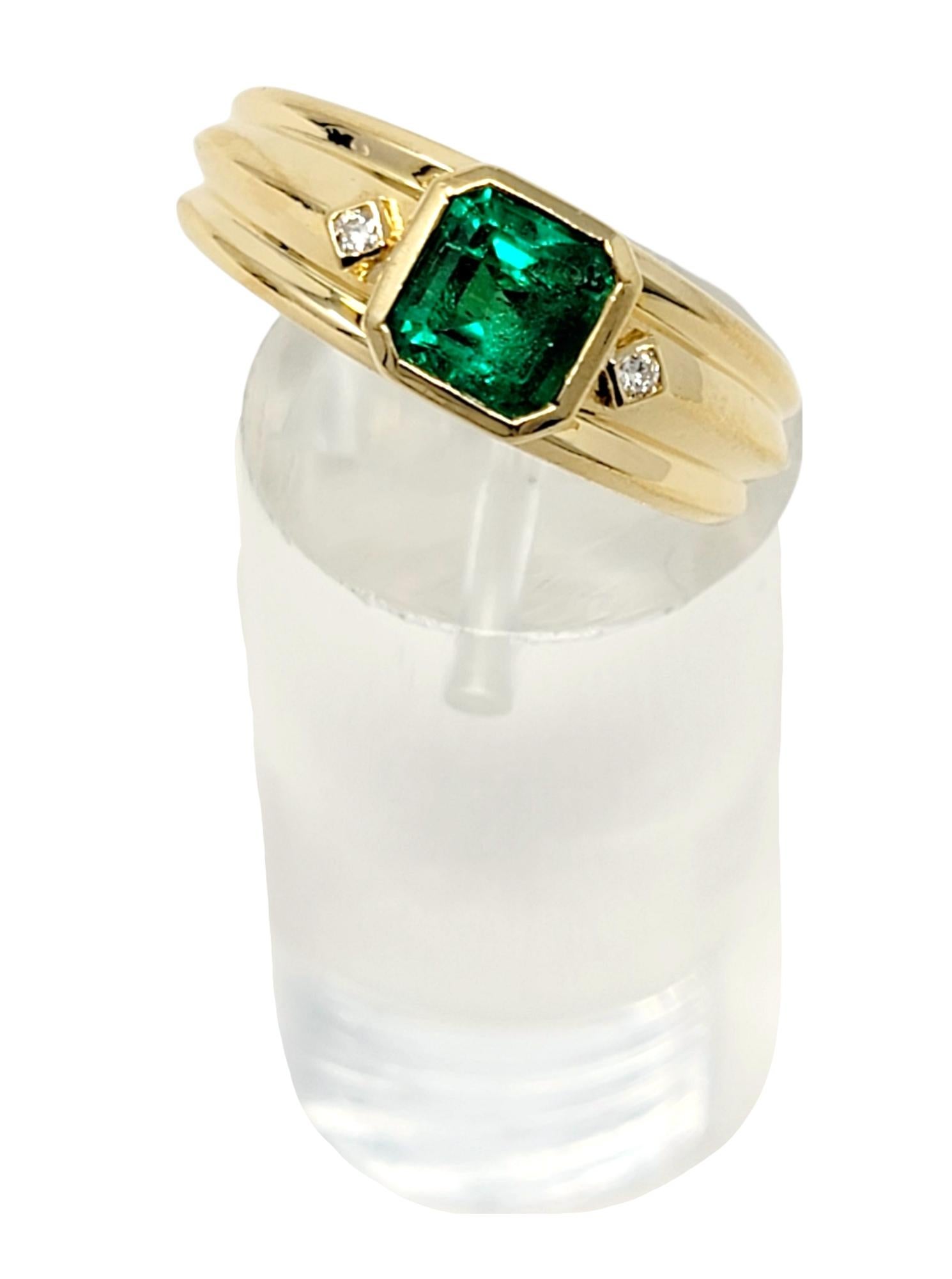 Emerald Cut Emerald and Diamond Ridged Band Ring in 18 Karat Yellow Gold For Sale 1