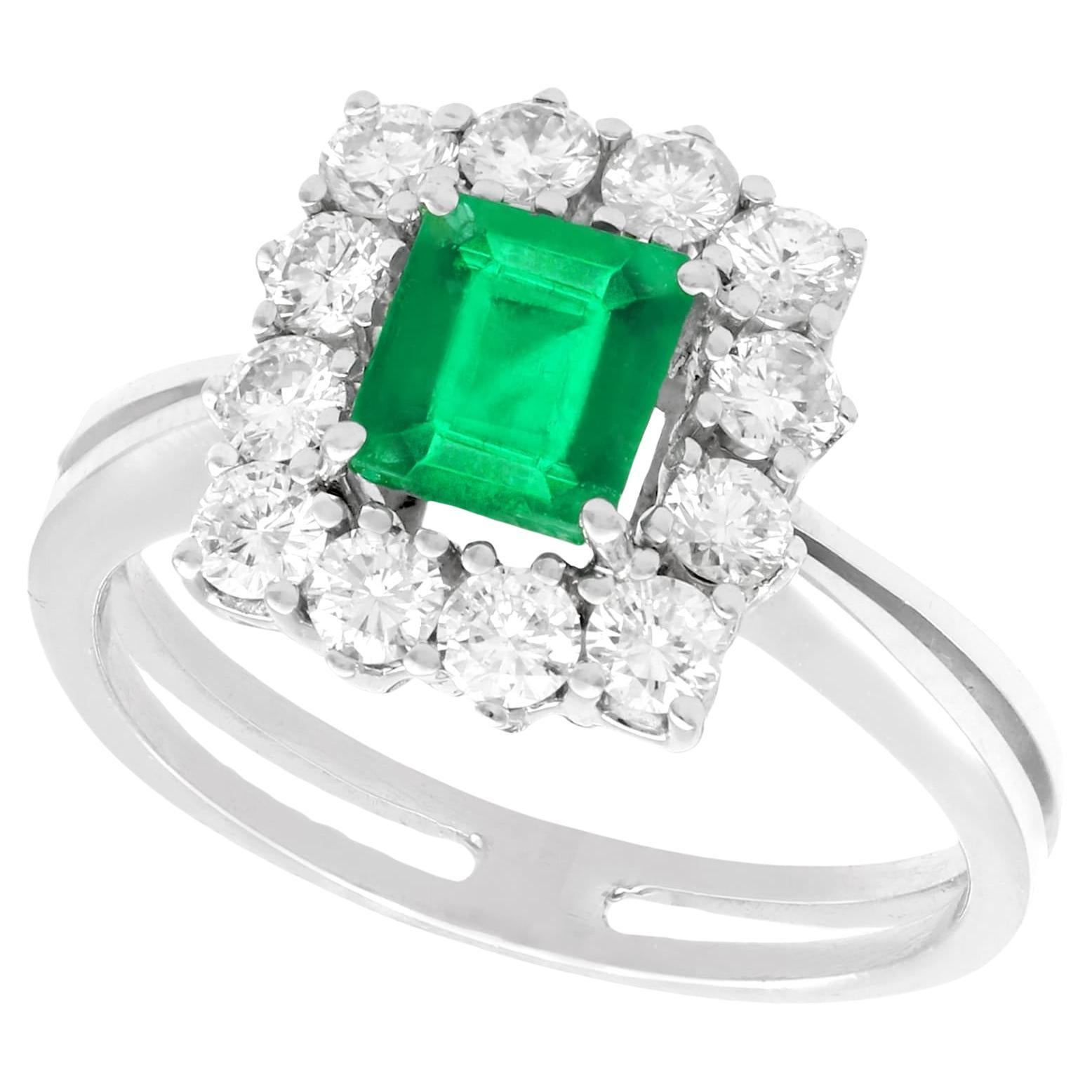 Emerald Cut Emerald and Diamond White Gold Cluster Ring For Sale