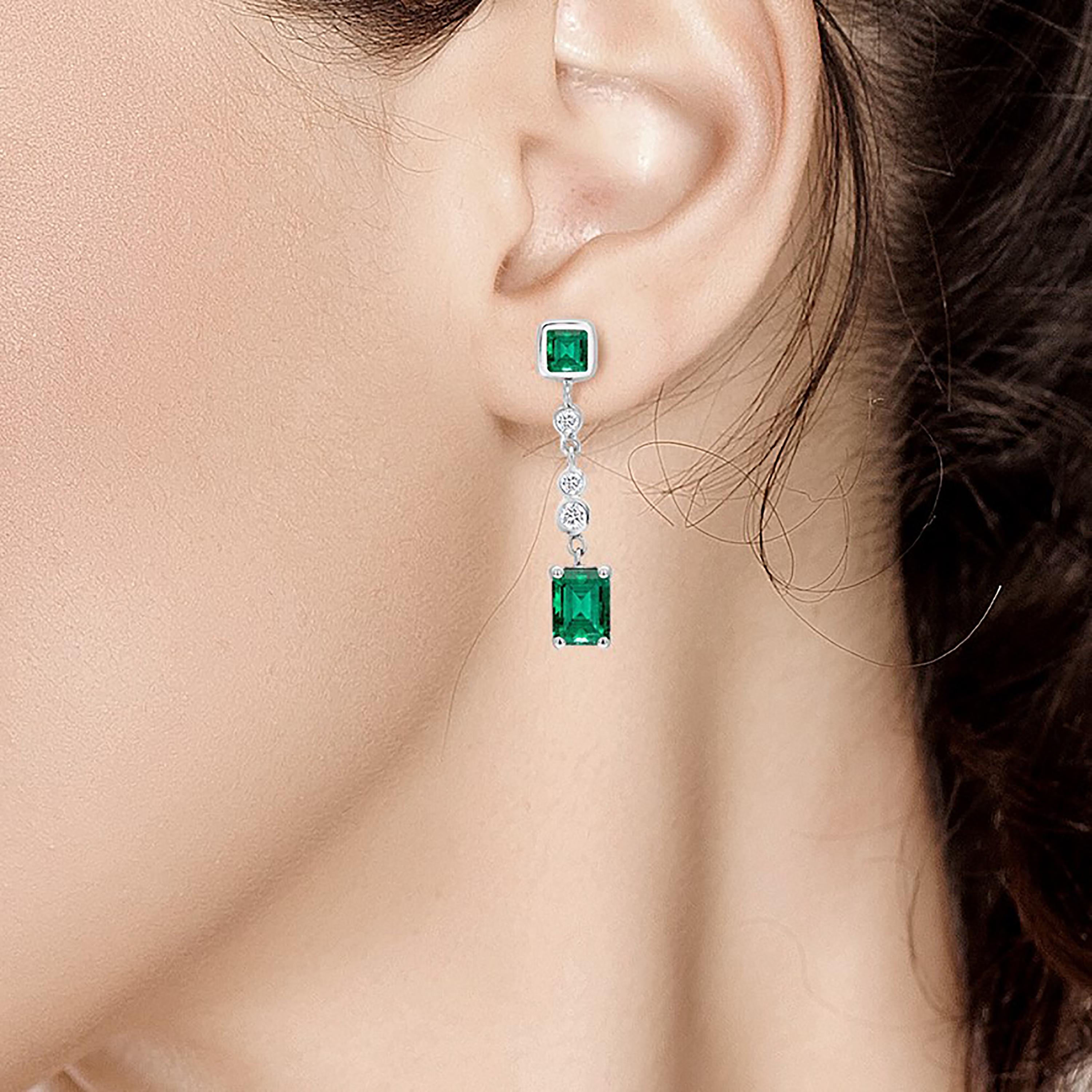 emerald cut emerald drop earrings