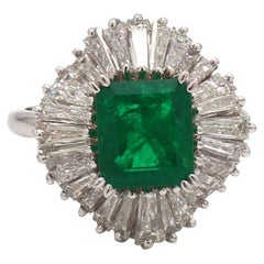Emerald-Cut Emerald Ballerina Platinum Ring with Baguette Diamond Accents