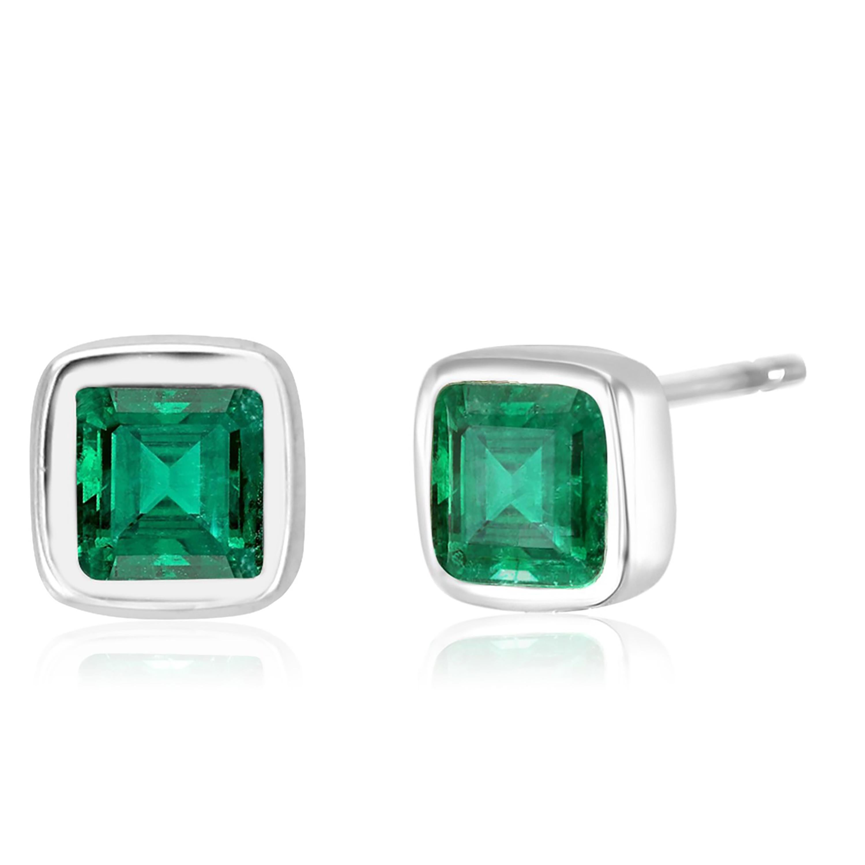 Emerald Cut Emerald 0.75 Carat Bezel Set White Gold Stud Earrings  In New Condition In New York, NY