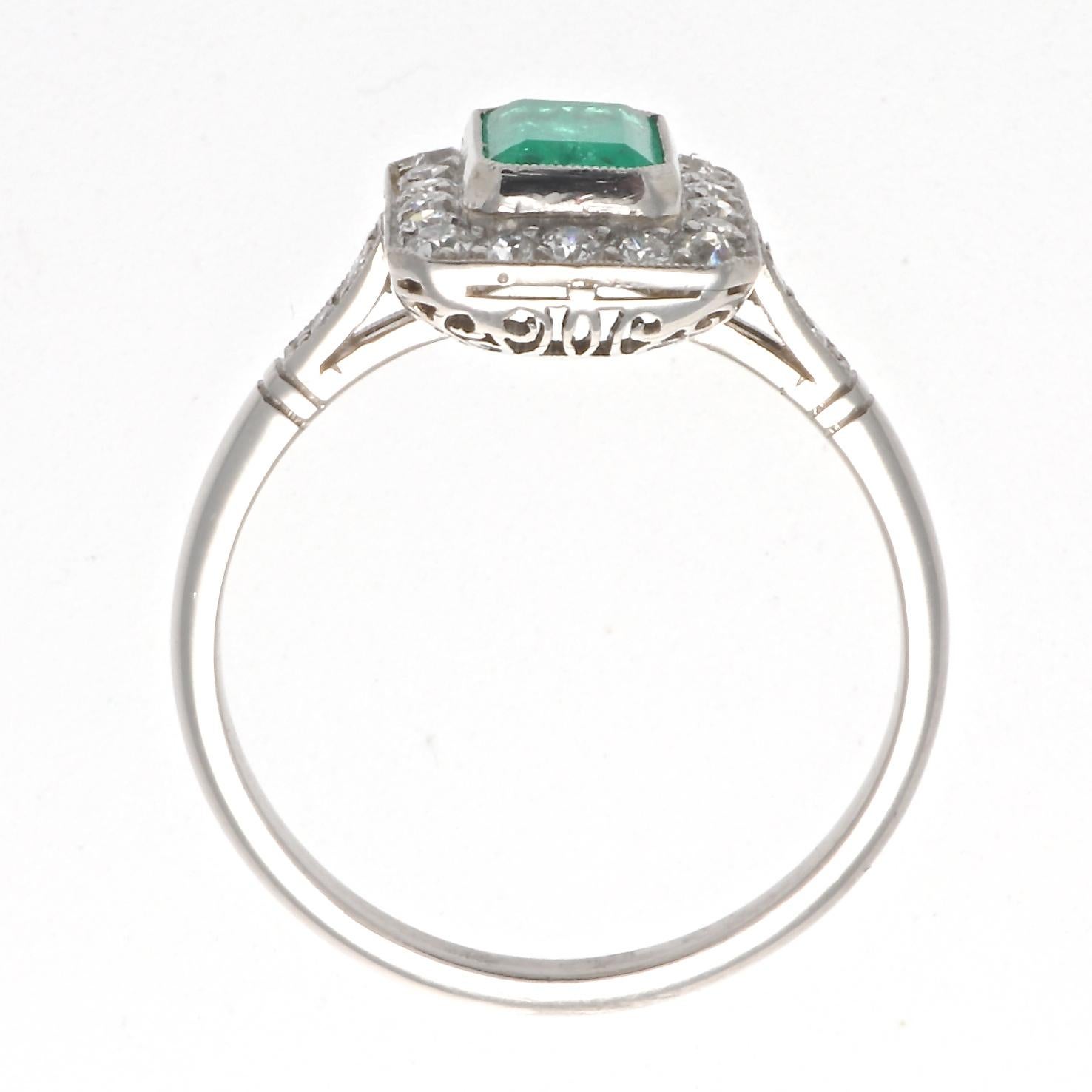 Round Cut Emerald Cut Emerald Diamond Platinum Ring