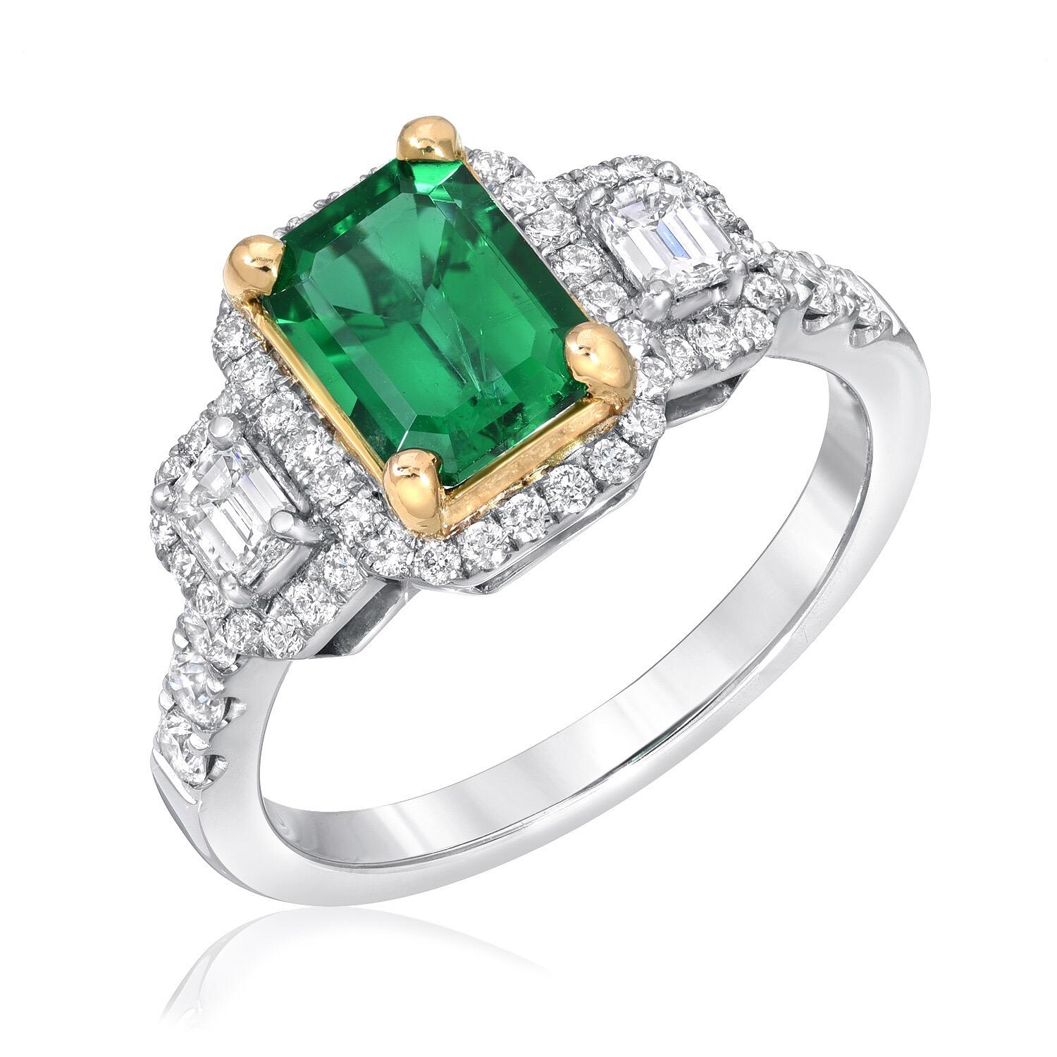 Emerald ring set with a 1.24 carat emerald cut, and a total of 0.74 carats of emerald cut diamonds and round brilliant diamonds. This three-stone Emerald ring is crafted in 18K white and yellow gold.
Emerald ring size 6.5. Resizing is complimentary