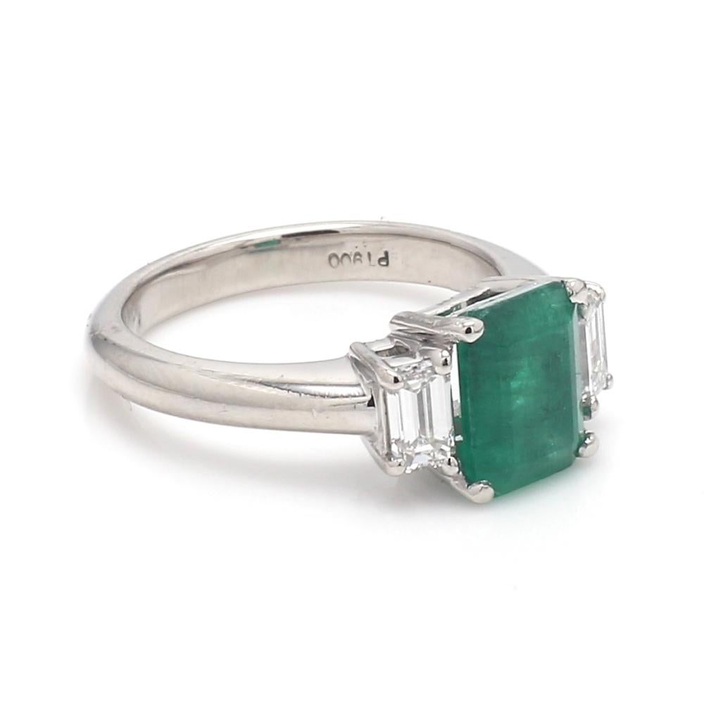 Platinum Ring with Emerald Cut Green Emerald and White Diamonds

This elegant platinum ring features a 1.42 carat emerald cut green emerald, flanked by white diamonds totaling 0.41 carats. Sized at 4 and resizable, this piece is a refined addition