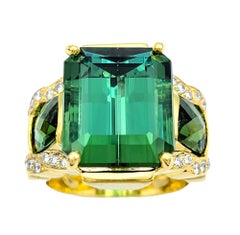 Emerald Cut Green Tourmaline 3 Stone Ring with Diamonds in 14 Karat Yellow Gold