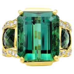 Emerald Cut Green Tourmaline 3 Stone Ring with Diamonds in 14 Karat Yellow Gold 