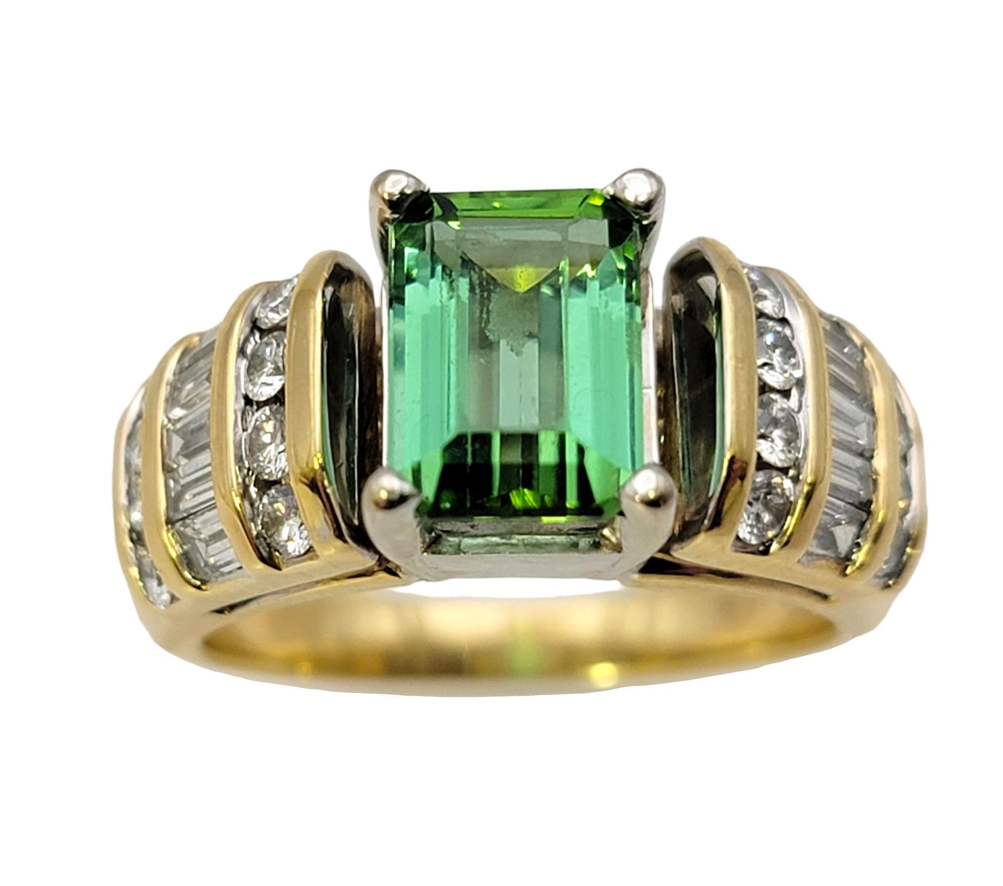 Ring size: 6.25

This pretty two tone band ring has bold color, significant sparkle and a unique design. The elegant bluish green tourmaline stone pops at the center while the sparkling diamonds shine against the warm yellow gold setting.  

This