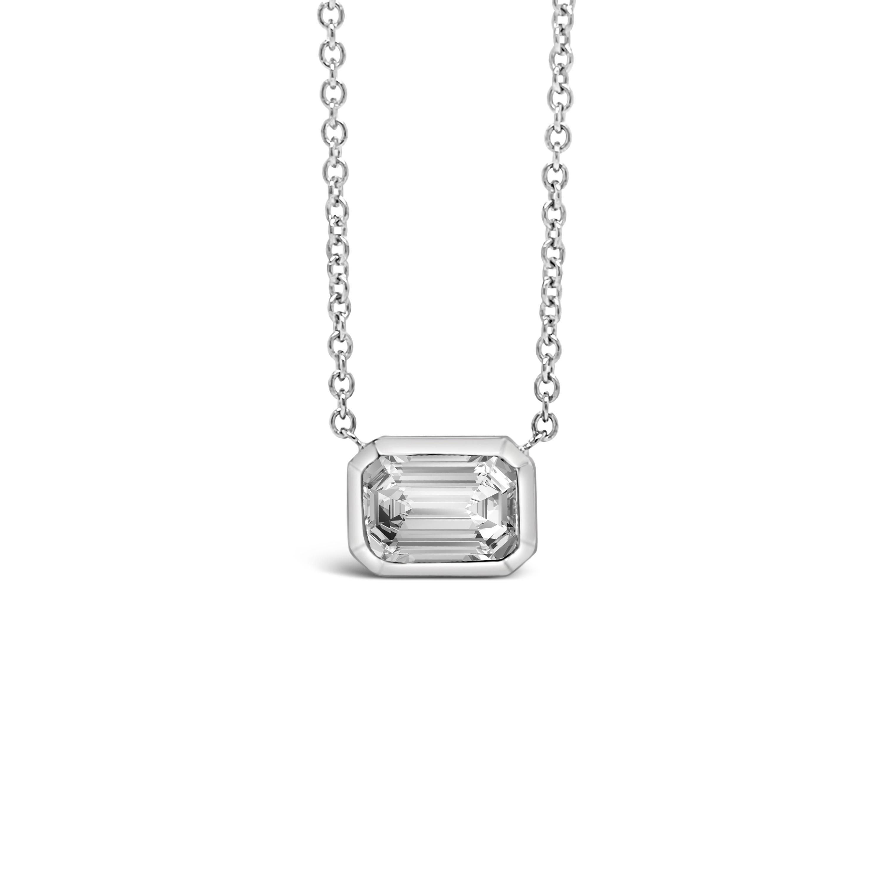 This pendant features a 1.00 carat Emerald cut diamond set horizontally.
The diamond is G Color, VS2 Clarity. The Pendant is set in 18K White Gold.
The Diamond is GIA certified