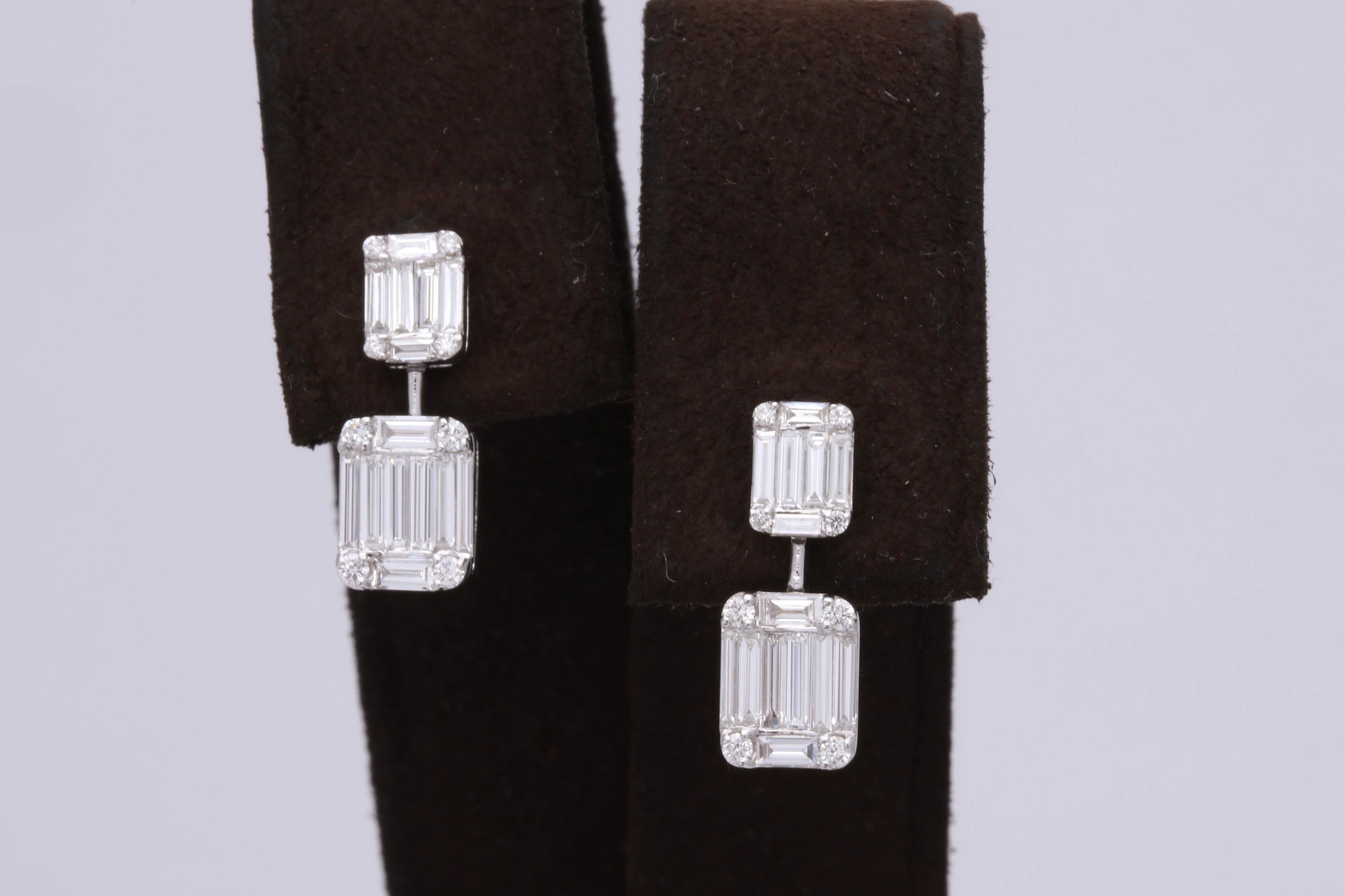 
An AMAZING earring!

1.37 carats of round and special cut F color VS clarity diamonds give an illusion Emerald cut diamond look.  Set in 18k white gold.

The combination of the different cuts give these earrings a special sparkle.

A wonderful gift