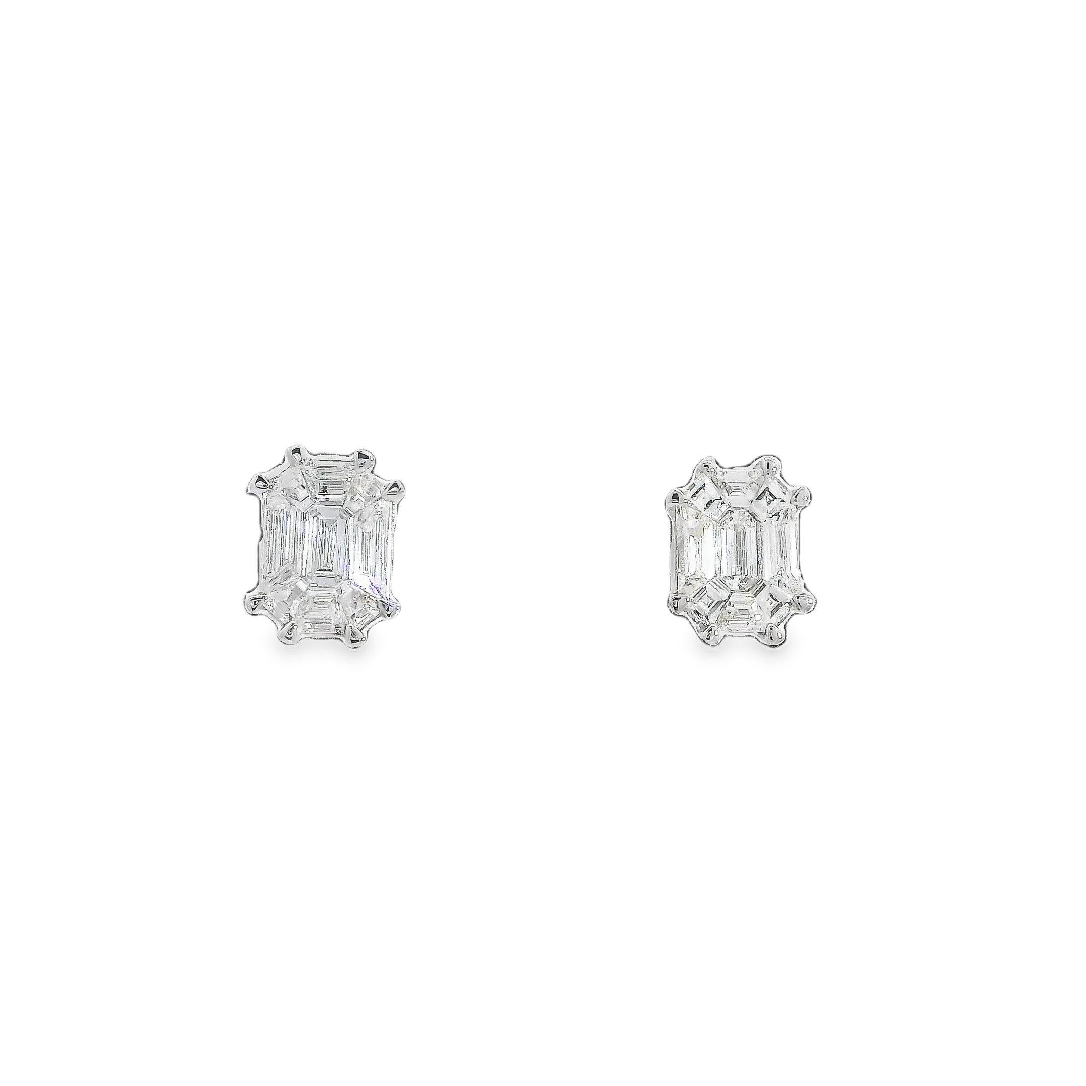 These elegant stud earrings exude refined sophistication through their intricate design featuring 18 individually set diamonds that come together to create the illusion of a single, large gemstone at the center of each earring. Meticulous