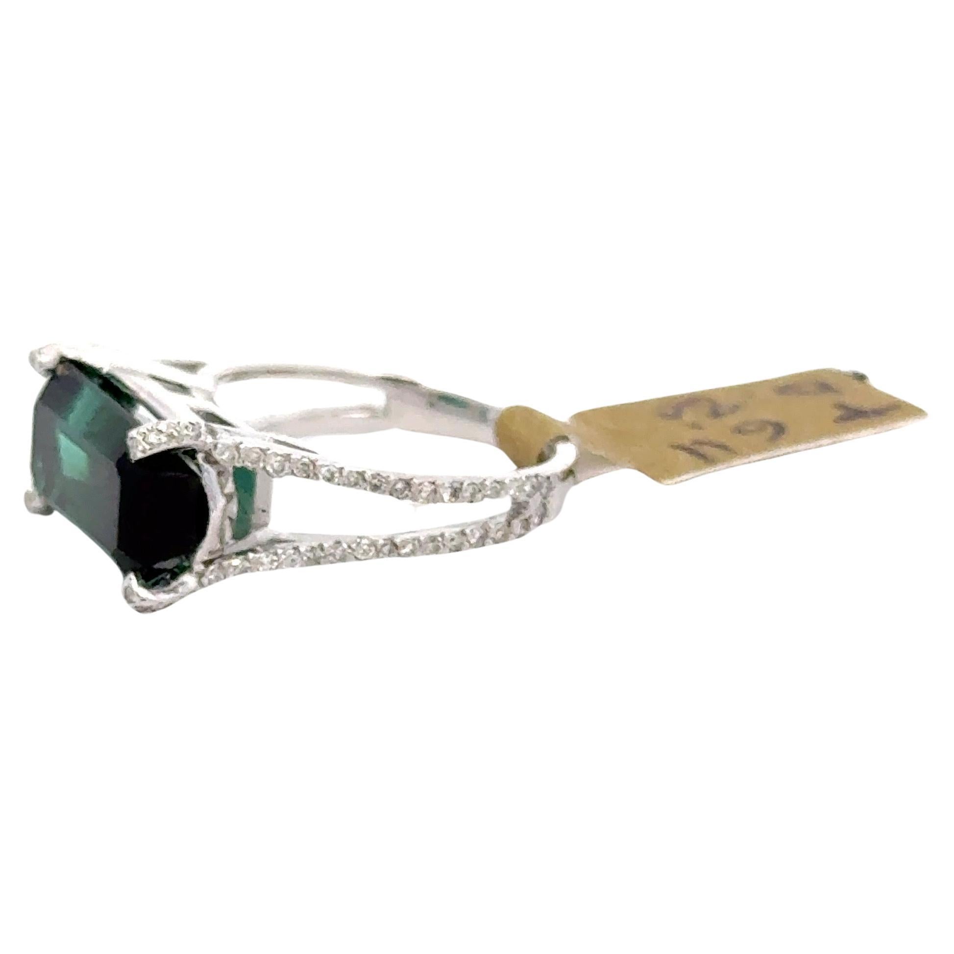 Contemporary Emerald Cut Indicolite Tourmaline Split Shank Diamond Ring 6.91 Carats 18KT For Sale
