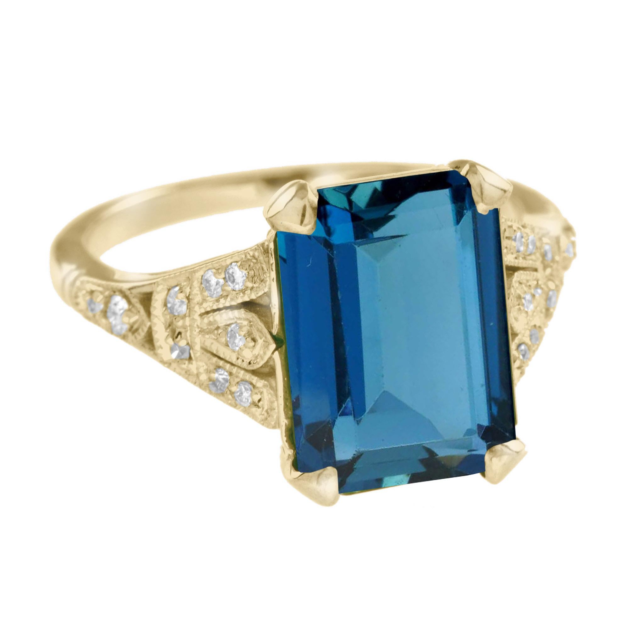 Art Deco Emerald Cut London Blue Topaz and Diamond Solitaire Ring in 14K Yellow Gold For Sale