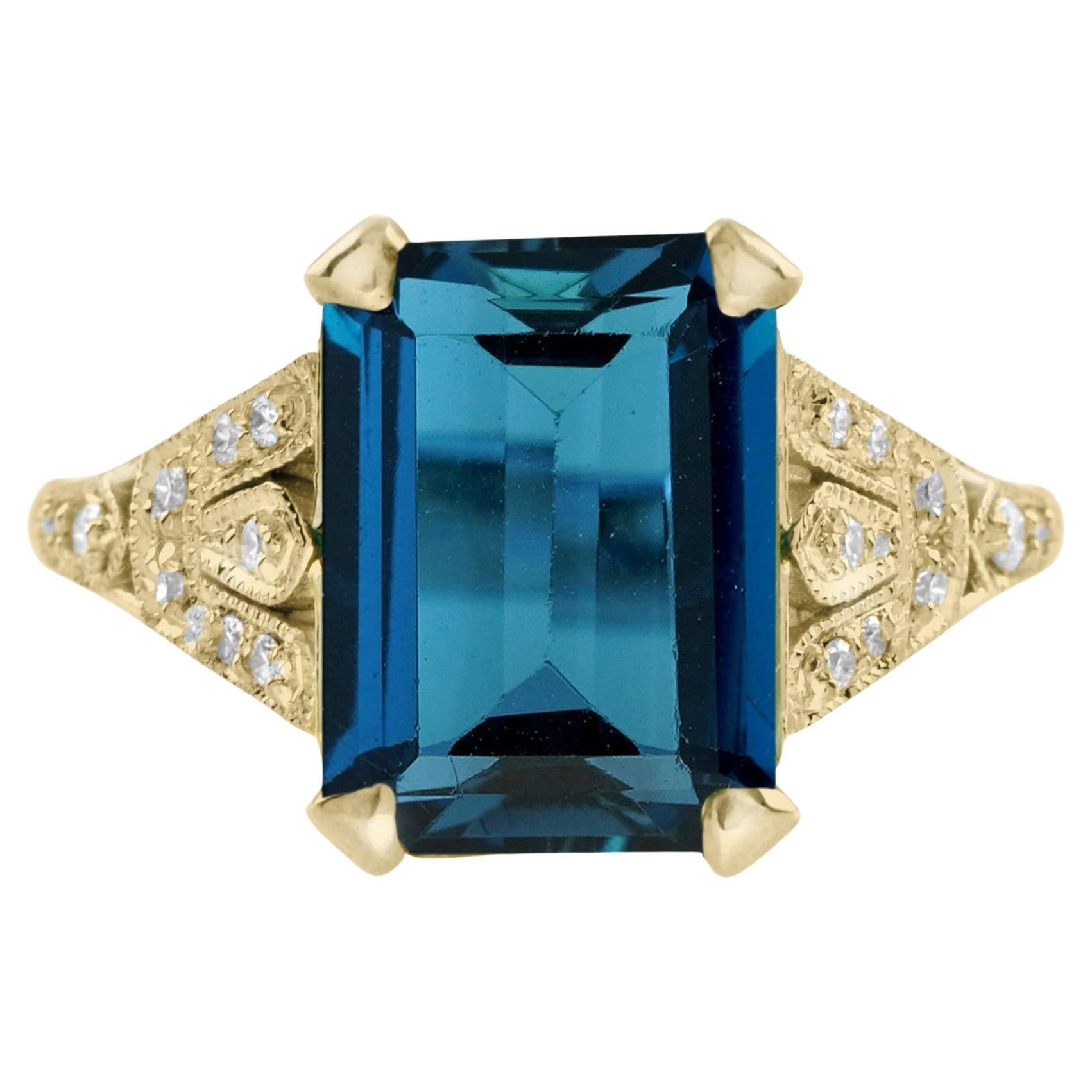 Bague solitaire en or jaune 14 carats, topaze bleue de Londres taille émeraude et diamant en vente
