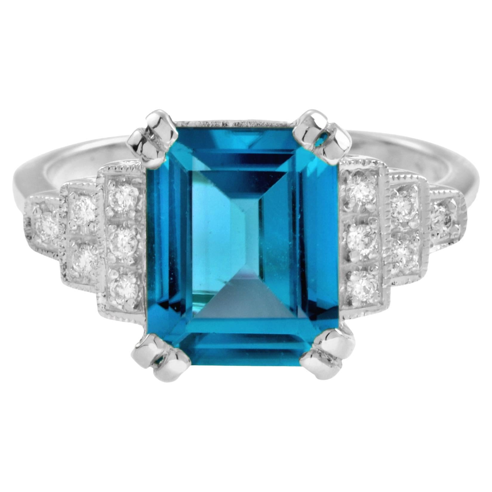 For Sale:  Emerald Cut London Blue Topaz and Step Diamond Engagement Ring in 18K White Gold