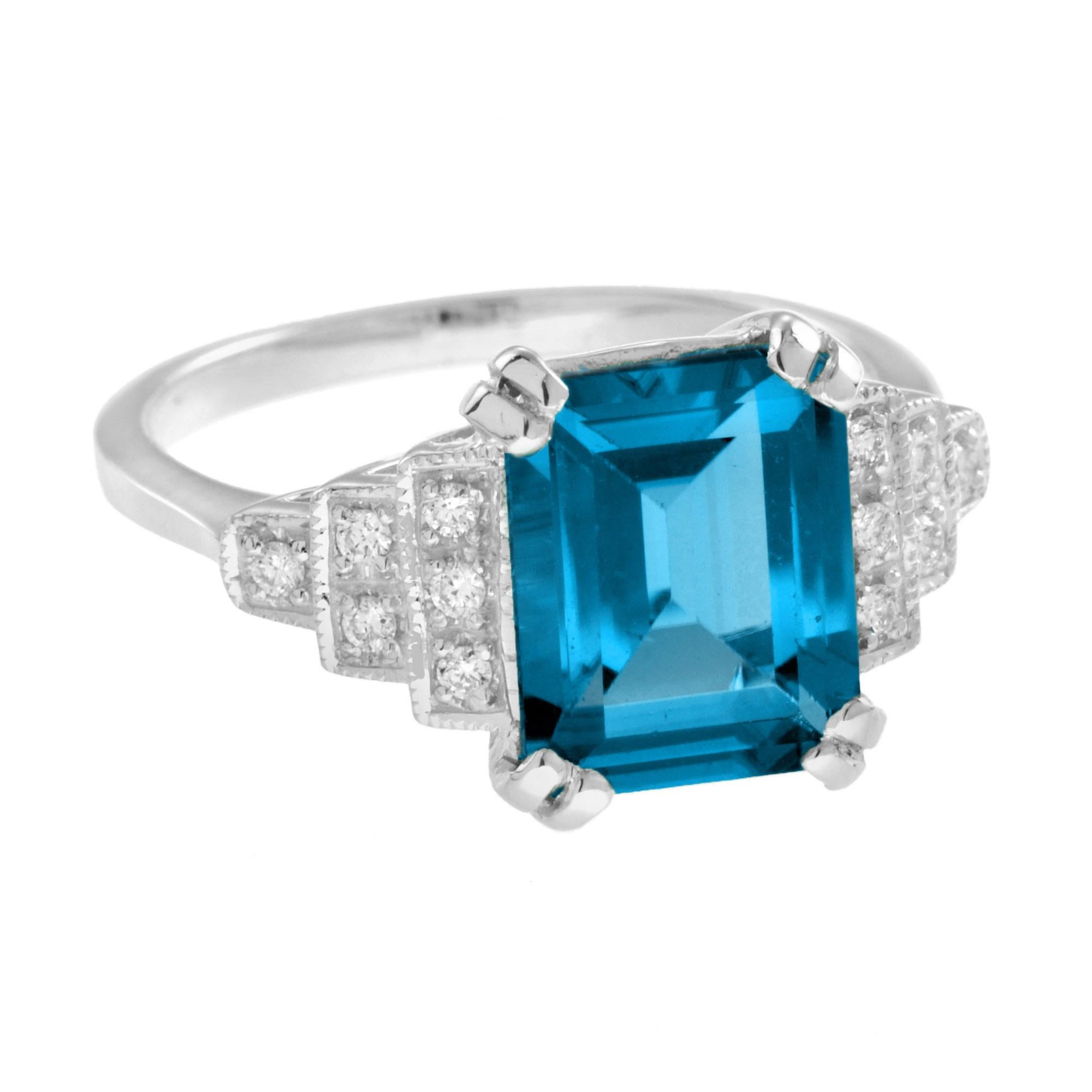 This gorgeous ring features a striking London blue topaz set between step design diamonds set shoulders. With a total 12 diamonds, this exquisite ring is a wonderful addition to your fine jewelry collection. 14K White Gold. 
Ring Information
Style: