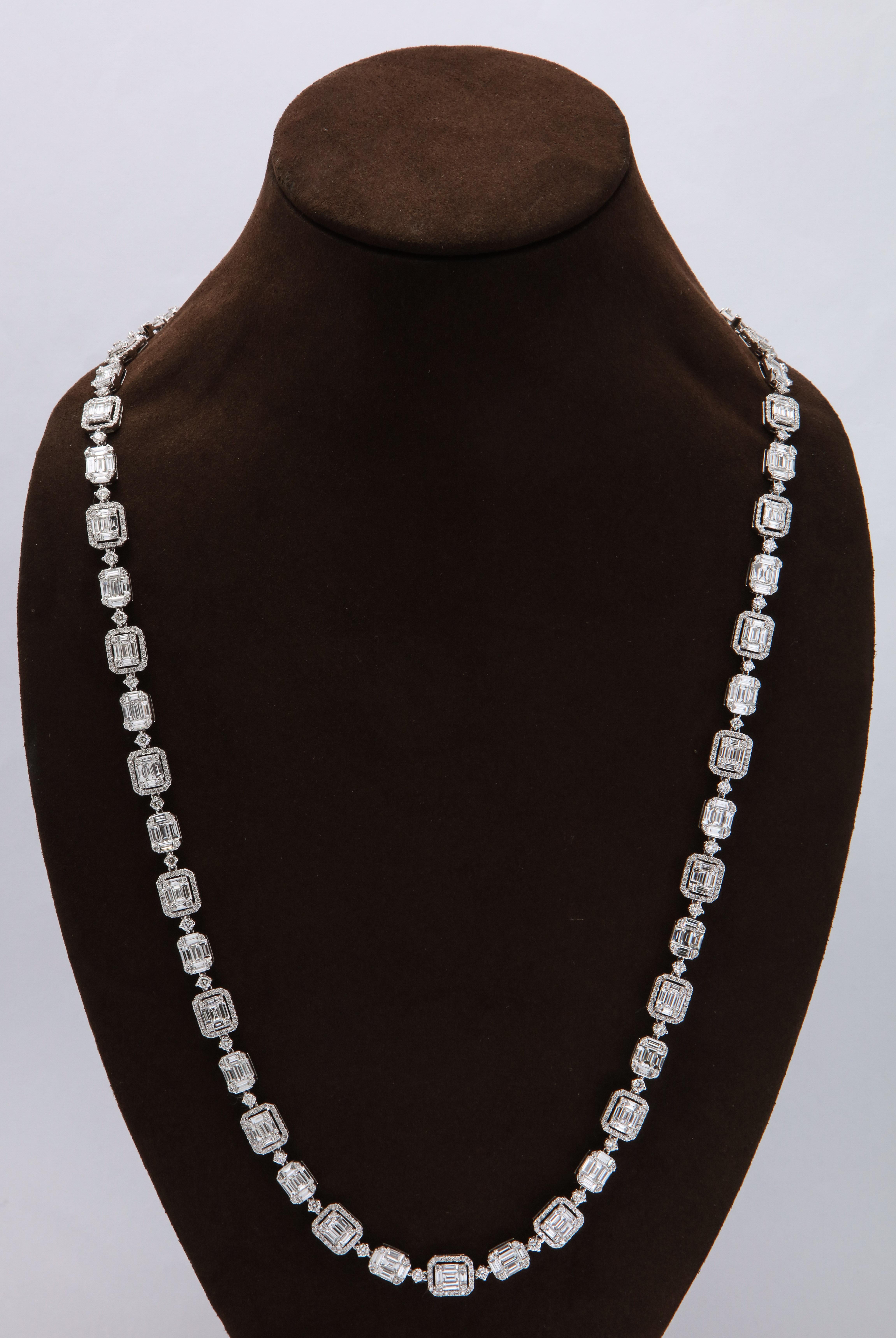 
A FABULOUS piece with many wearable options!!  

This necklace was designed with multiple locks so that it can detach and be worn as a 25 inch necklace WITH a 7 inch bracelet as well!!

37.86 carats of round and special cut F color VS clarity