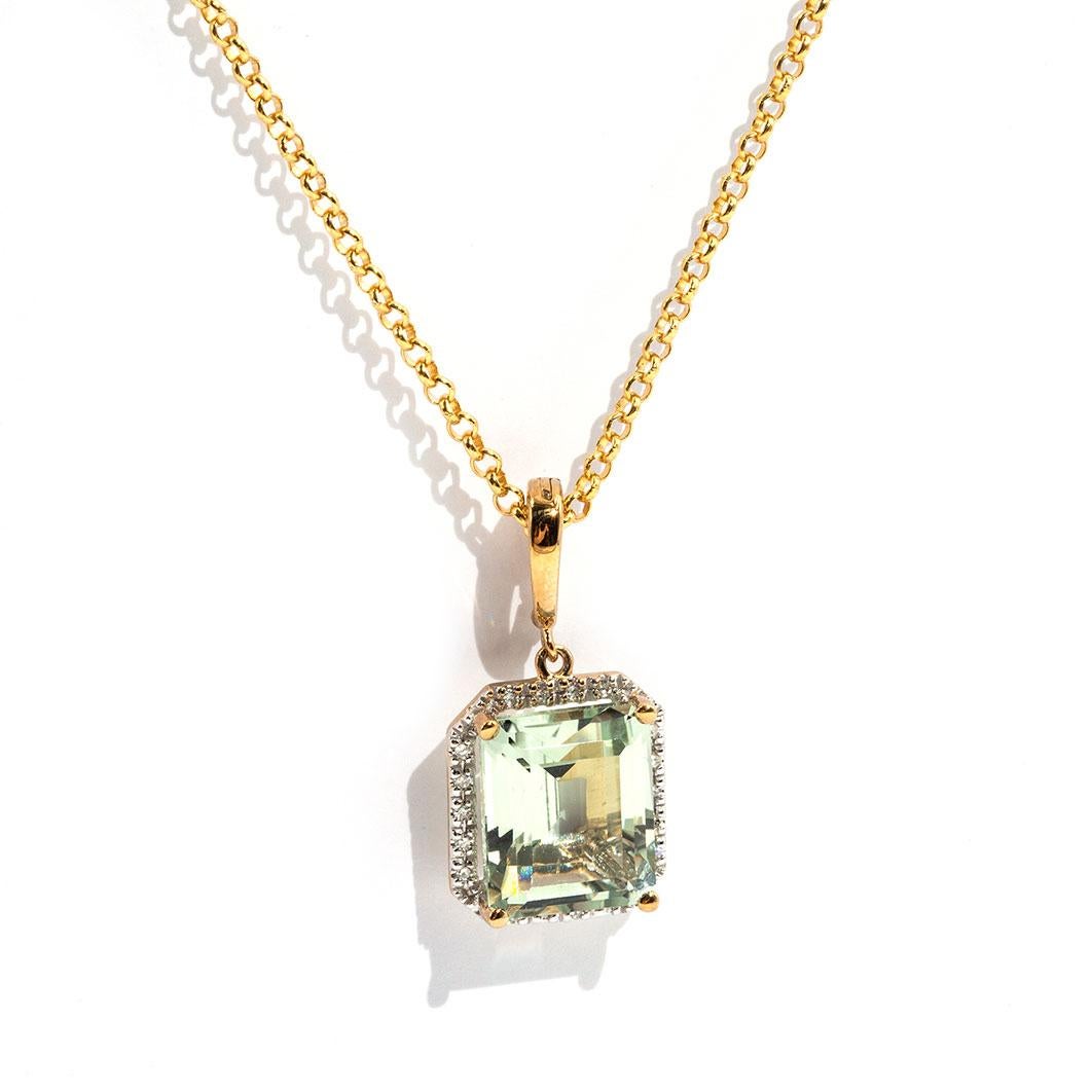 Forged in 9 carat yellow gold is this vintage inspired pendant featuring a bright natural emerald cut mint colour quartz gemstone and is surrounded by a halo border of carefully set diamonds.  We have  The Sofia Pendant is threaded on a 9 carat