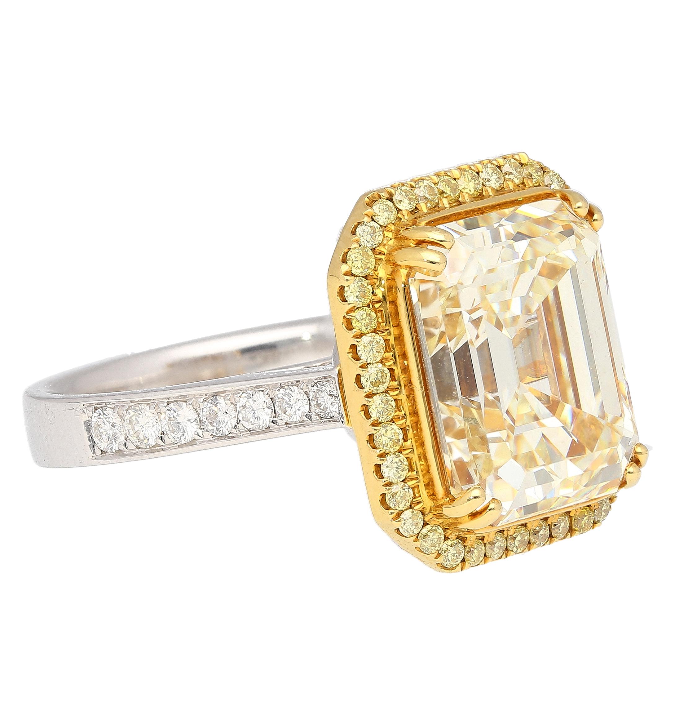 Emerald Cut Natural 7.25 Carat Fancy Light Yellow Diamond & Diamond Halo Ring In New Condition For Sale In Miami, FL