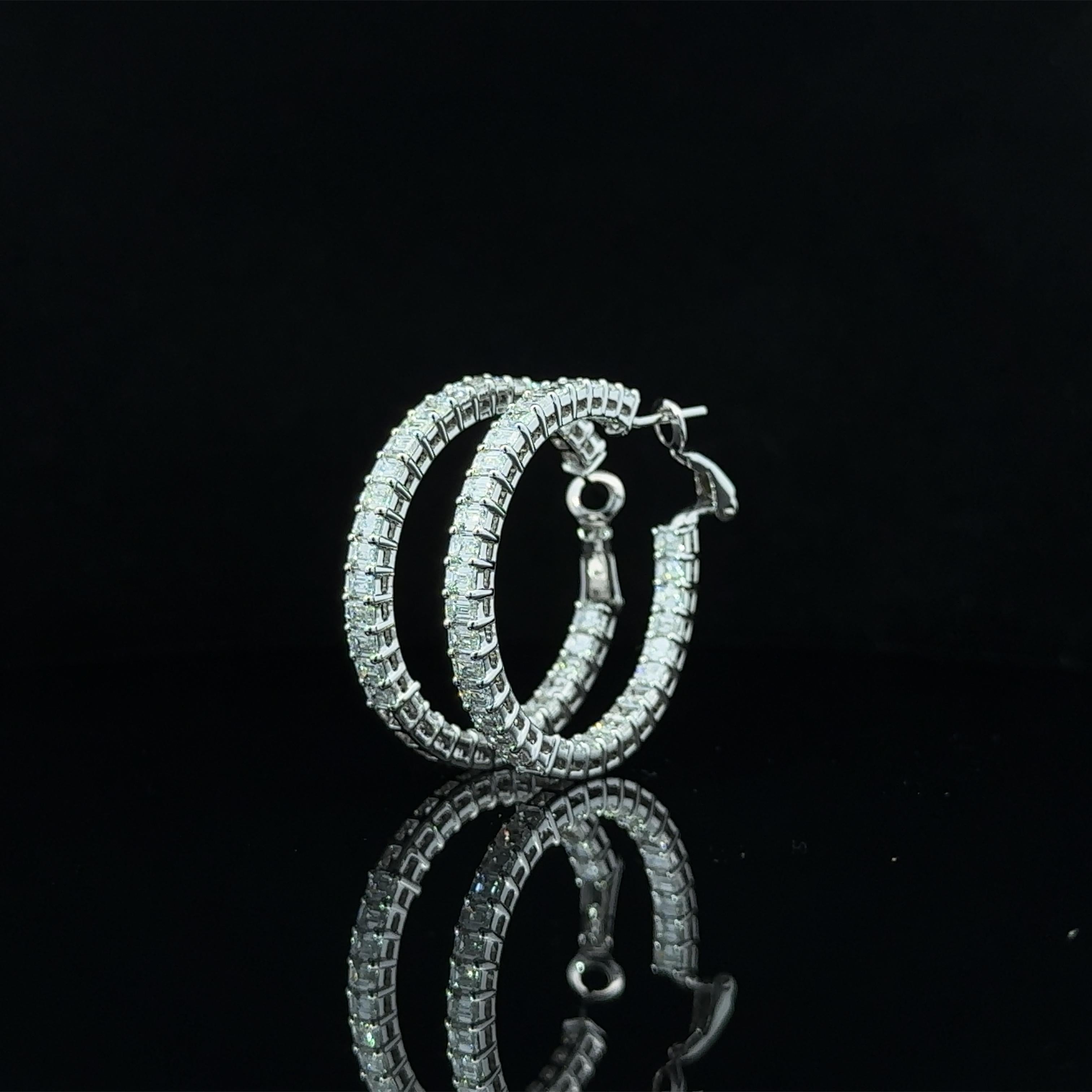 Step into a world of opulence and sophistication with these exquisite Emerald-Cut Natural Diamond Hoops, adorned with a breathtaking total of 6.1 carats of VVS  diamonds. Each facet of these magnificent hoops reflects unparalleled luxury and