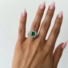 Emerald Cut Natural Green Emerald Diamond Cluster Ring in Platinum 900