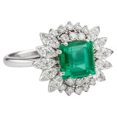 Emerald Cut Natural Green Emerald Diamond Cluster Ring in Platinum 900