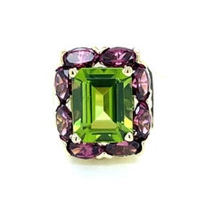 Emerald Cut Peridot and Amethyst 14 karat Yellow Gold Cocktail Ring