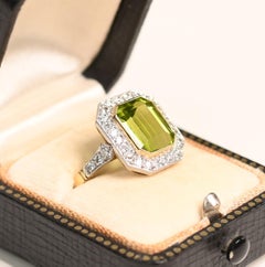 3.50 Carat Emerald Cut Peridot Ring. 0.40ct Diamond Halo Ring Platinum 18k Gold