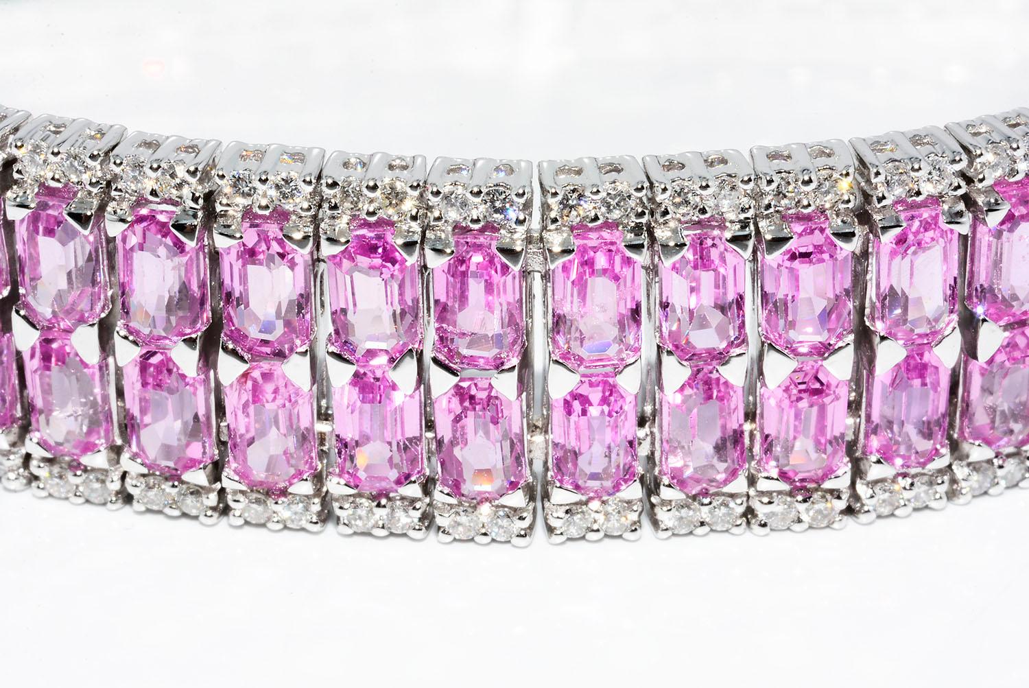 Emerald Cut Pink Sapphire and Diamond Bracelet 18k White Gold

Natural Emerald Cut Pink Sapphires 31.30 ct
Round Diamonds 1.60 ct G SI1
18k White Gold
Length 7 Inches