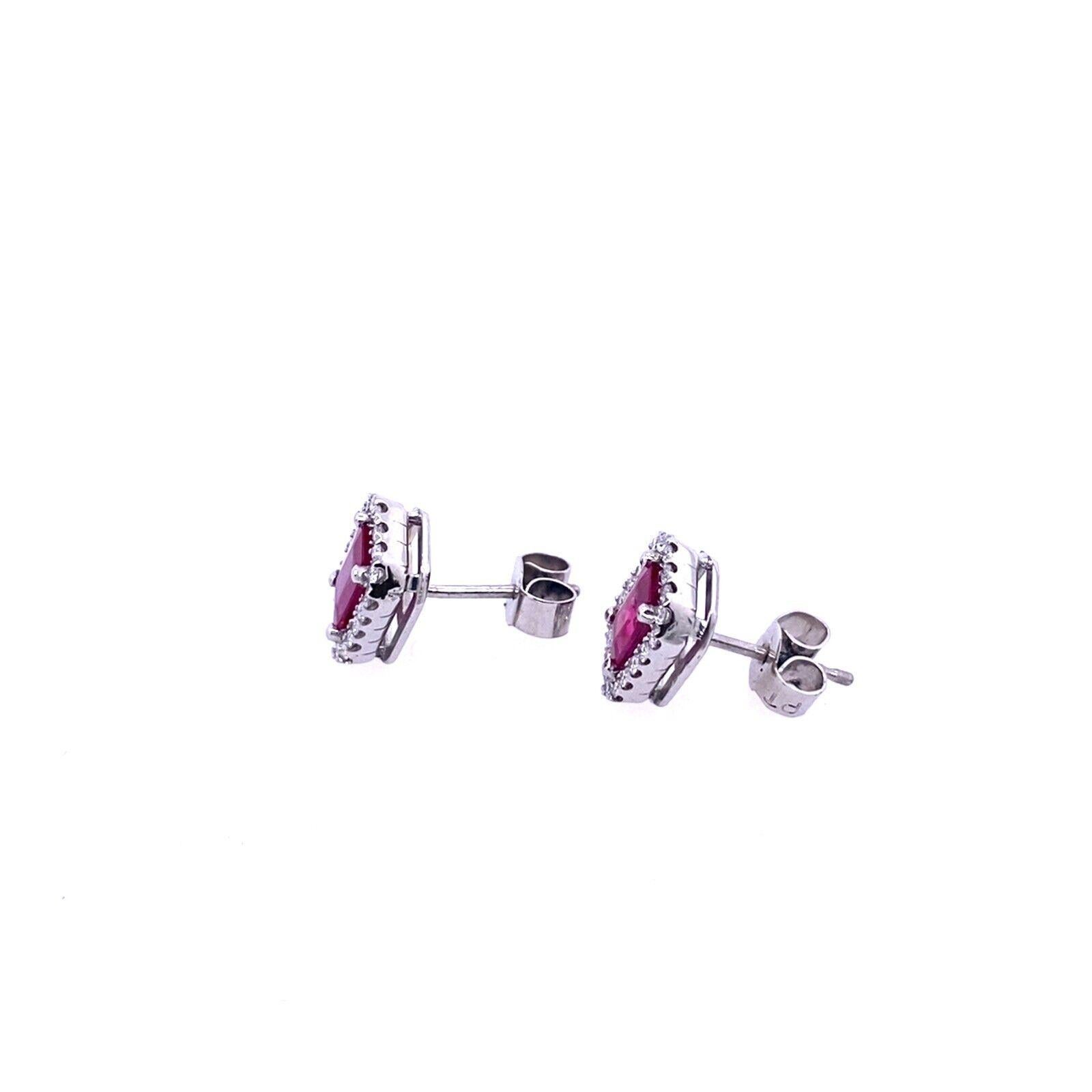 Round Cut Emerald Cut Rubies 1.24ct in Pair Set In Platinum Earrings, With 0.33ct Diamonds For Sale