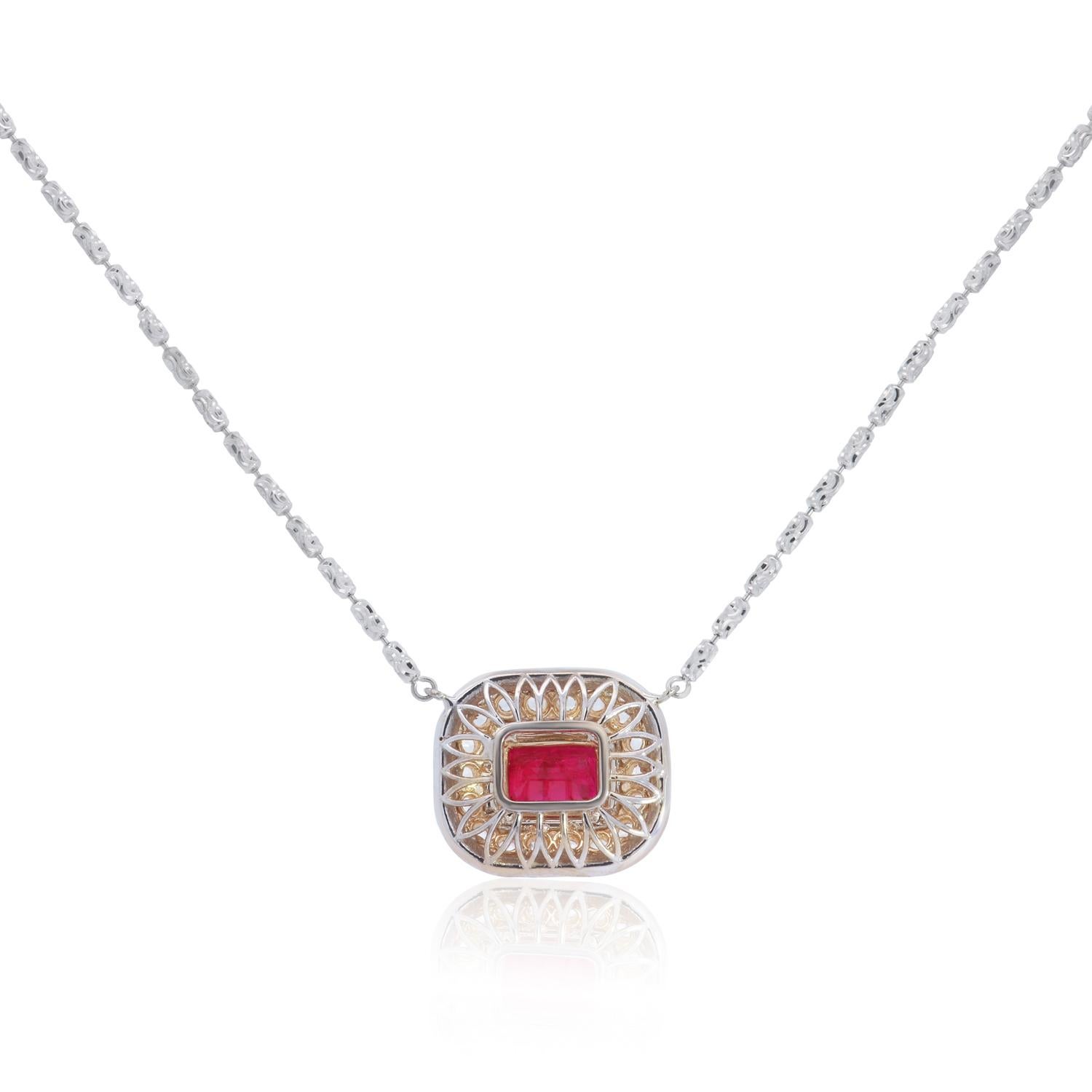 14K Two Tone Yellow and White Gold

1 Emerald Cut Ruby at approximately 2.47 Carats Total Weight - Measuring 8.7 x 7 millimeters

0.37 Carats Total Weight of Rose Cut Diamonds

0.50 Carats Total Weight of Round Brilliant White Diamonds

Color: H-I /