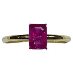 Emerald cut ruby engagement ring 18k yellow gold