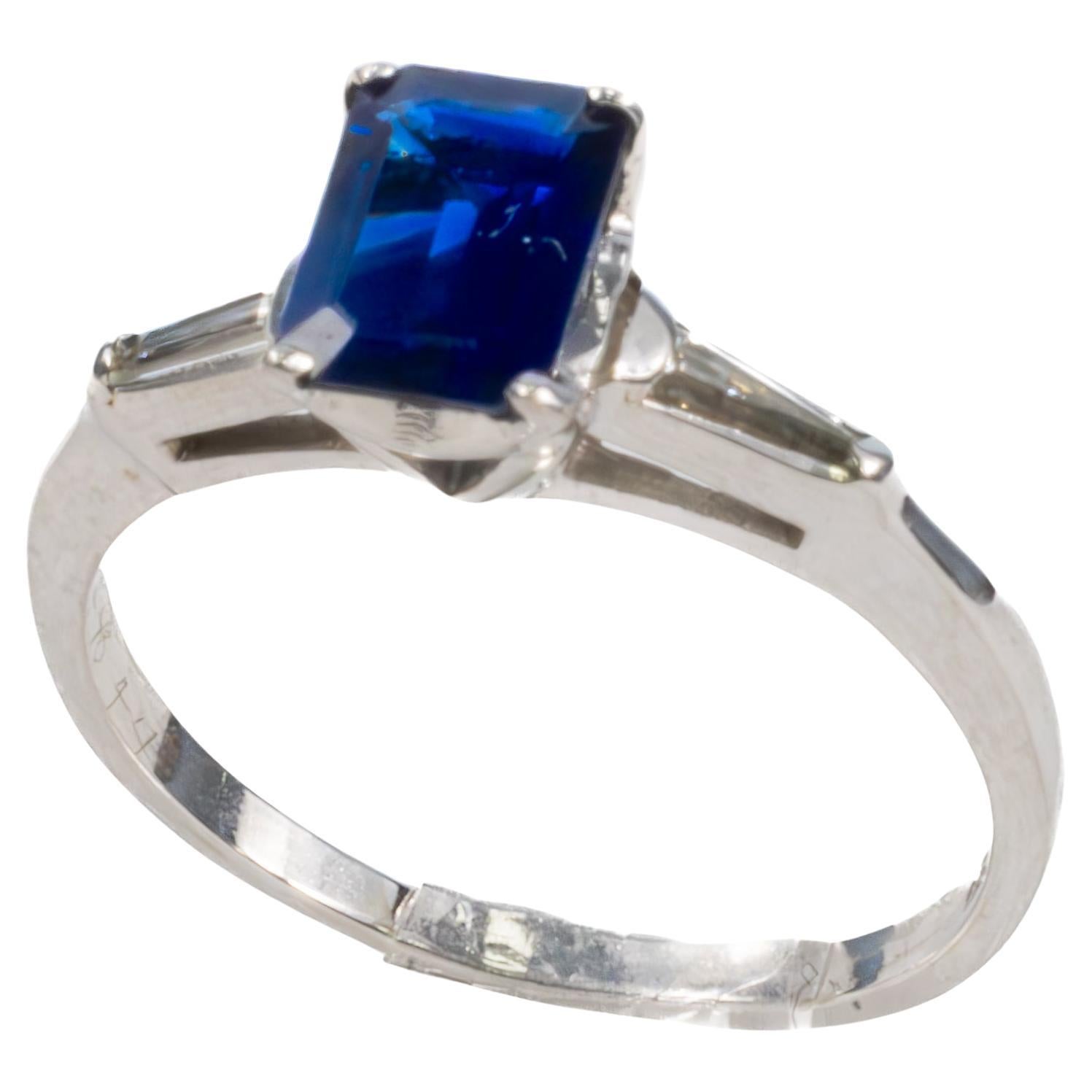 Emerald Cut Sapphire and Diamond Engagement Ring