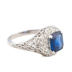 Emerald Cut Sapphire and Diamond Halo Filigree Ring