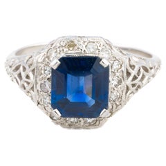 Emerald Cut Sapphire and Diamond Halo Filigree Ring