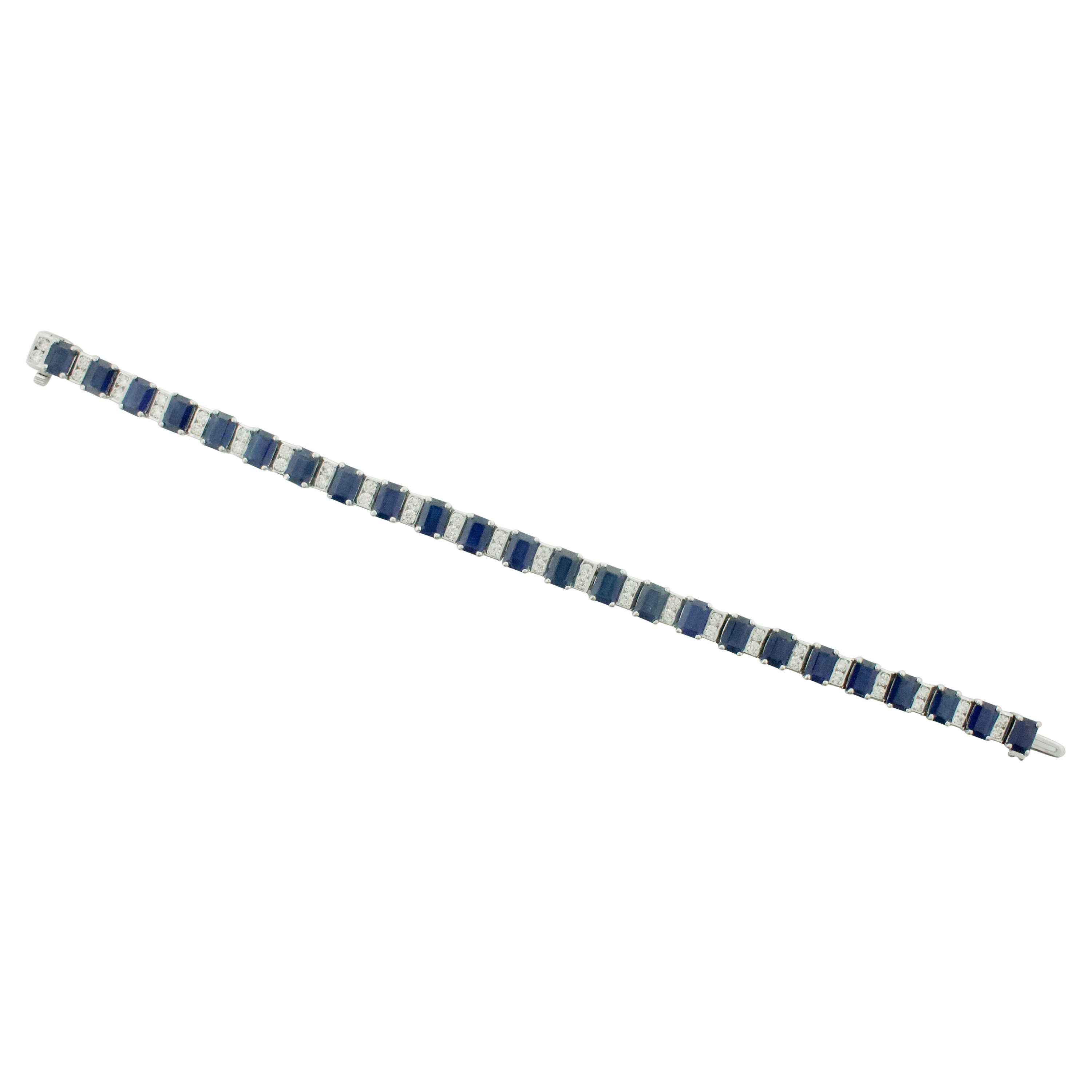 Pulsera de zafiro talla esmeralda y diamantes en 18k