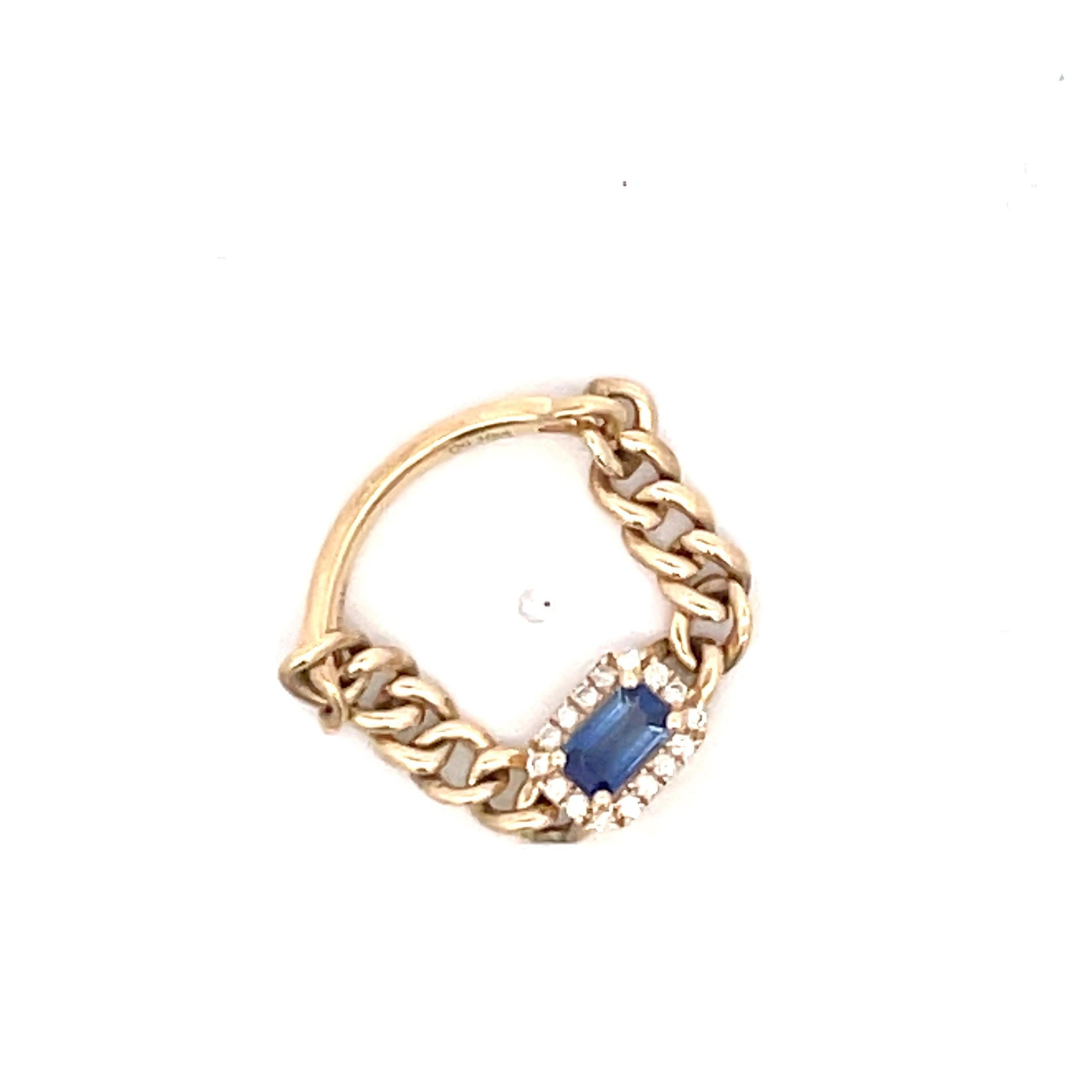 Fun & fashionable ring featuring an emerald cut blue Sapphire surround by small round brilliants on a 14 karat yellow gold Cuban link chain ring. 
Sapphire 0.15 Carats