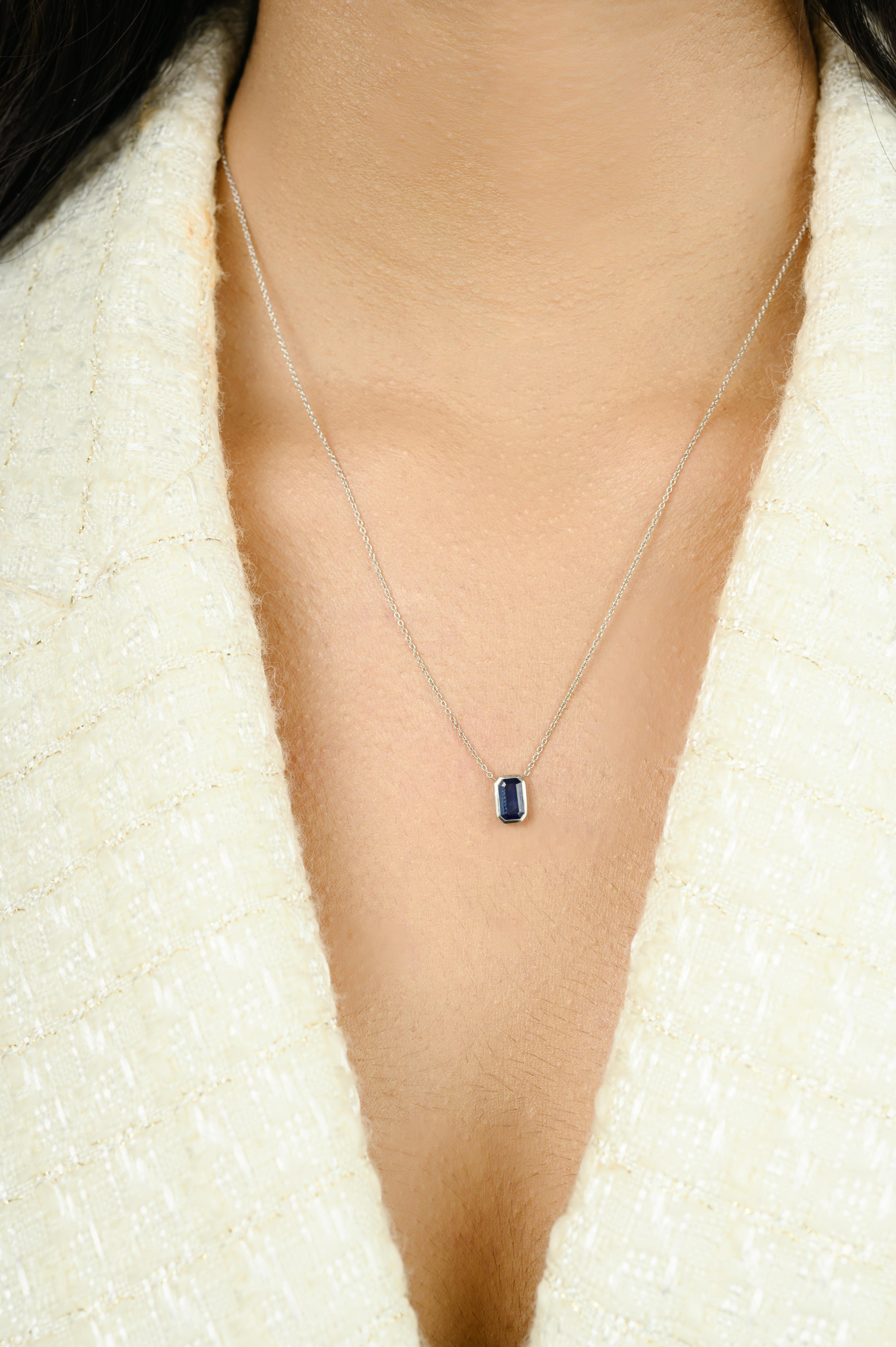 Emerald Cut Sapphire Pendant Necklace in 14K White Gold September Birthstone studded with octagon cut blue sapphire of 0.89 carats. This stunning piece of jewelry instantly elevates a casual look or dressy outfit. 
Sapphire stimulate concentration