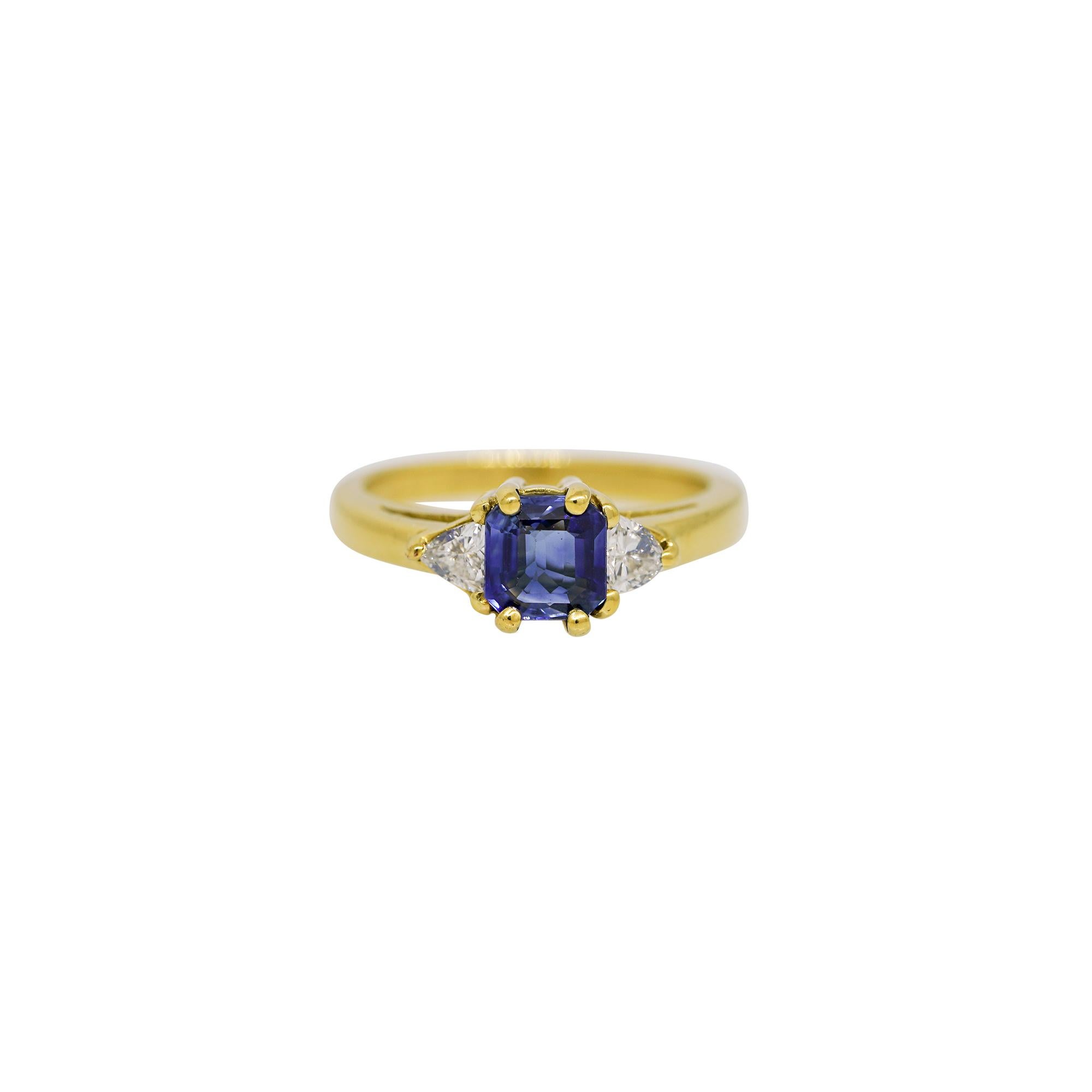 Emerald Cut Sapphire & Trillion Cut Diamond Side Stone 18 Karat Ring

Explore our in-stock 18-karat yellow gold sapphire and diamond side stone ring. A stunning blend of brilliance and sophistication, this ring is available now and one of a kind.